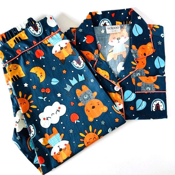 Kids navy blue cartoon print cotton shirt and pant set with full sleeve front button shirt and elastic waist pants soft comfortable sleepwear for boys and girls