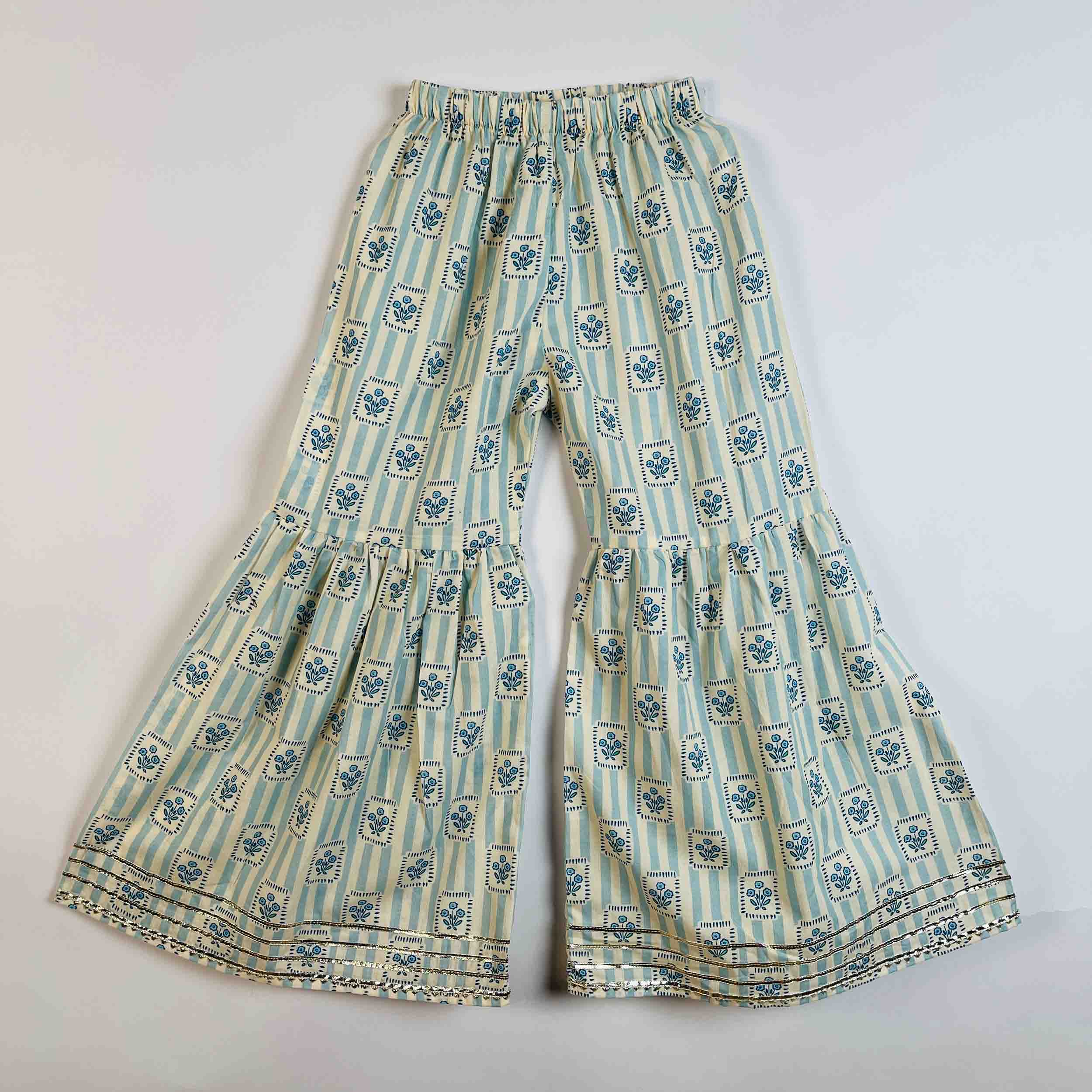 A pair of women's wide-leg pants featuring a vertical stripe pattern in sage green and cream, decorated with a repeating blue floral motif and a matching embroidered border at the hem.