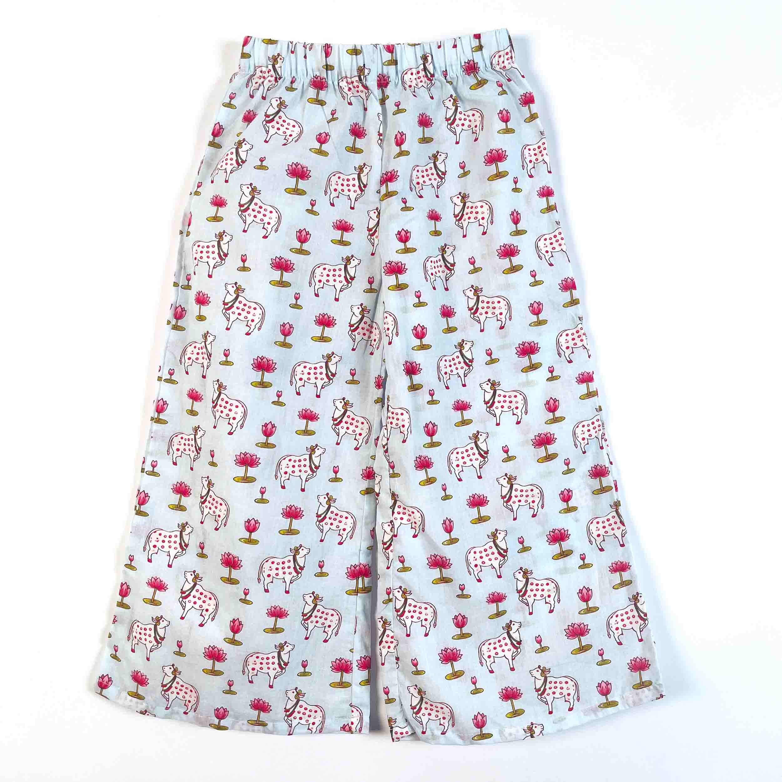 Kids Blue Pichwai cotton palazzo pajama with wide-leg design, elastic waistband, and all-over cow and floral print
