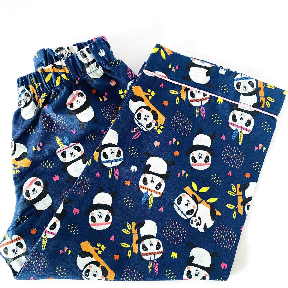 Navy blue fabric with panda and bamboo pattern, folded and displayed on a white background