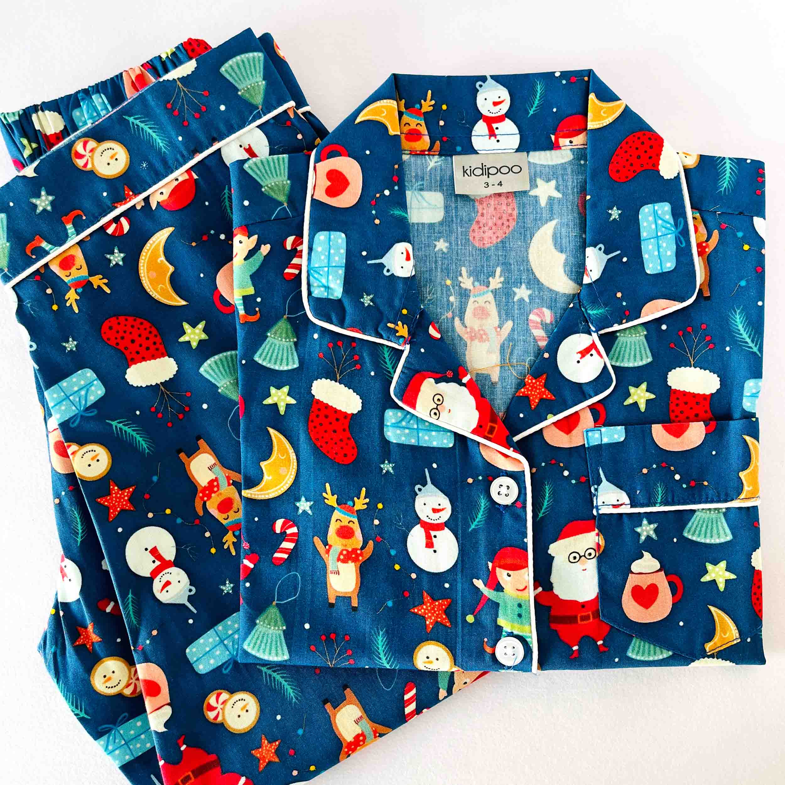 Kids dark blue Christmas print night suit soft cotton festive sleepwear set with Santa and holiday motifs