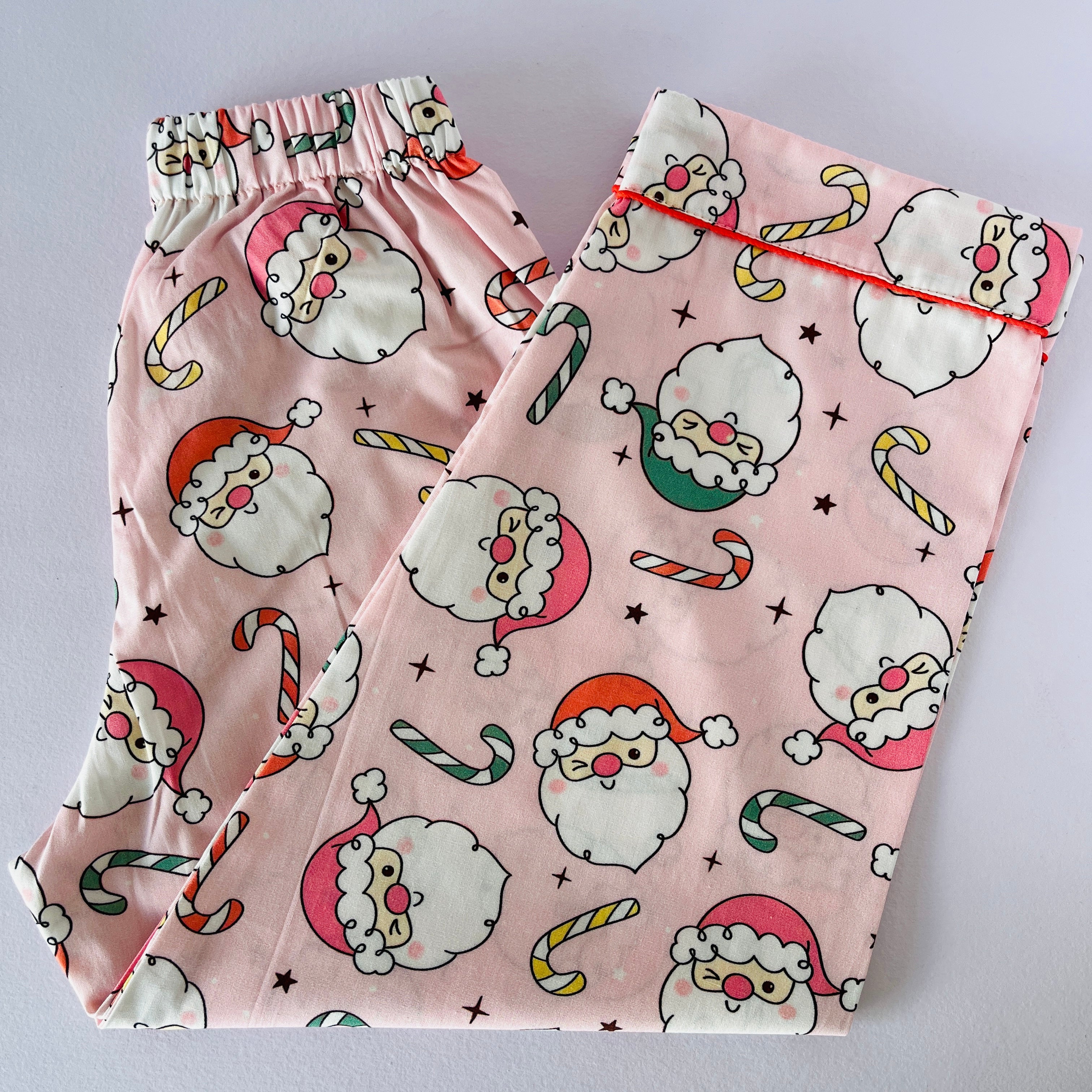 Pink Winking Santa Night Suit