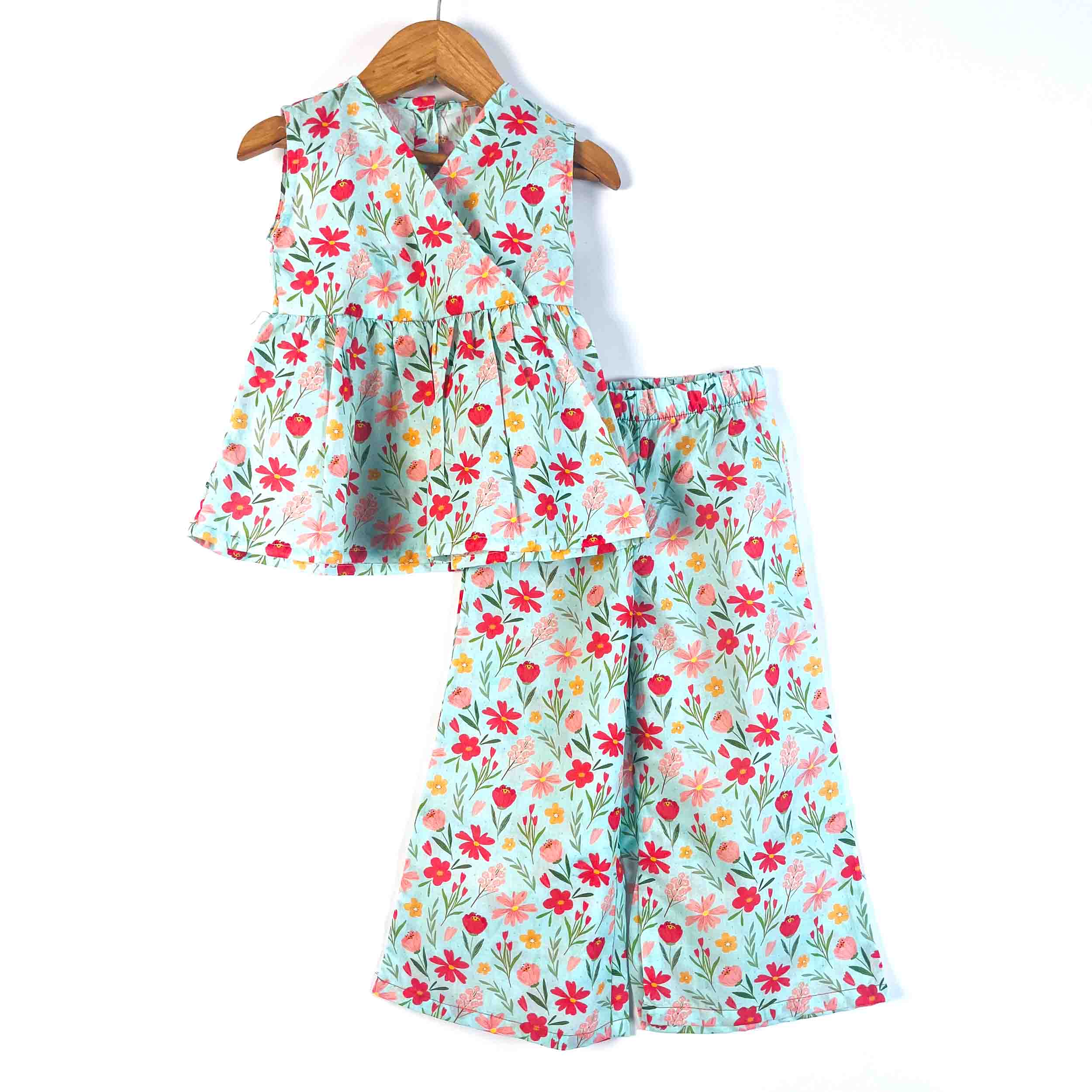 Girls' mint floral sleeveless peplum top with matching wide-leg palazzo pants, 100% premium cotton co-ord set on a white background