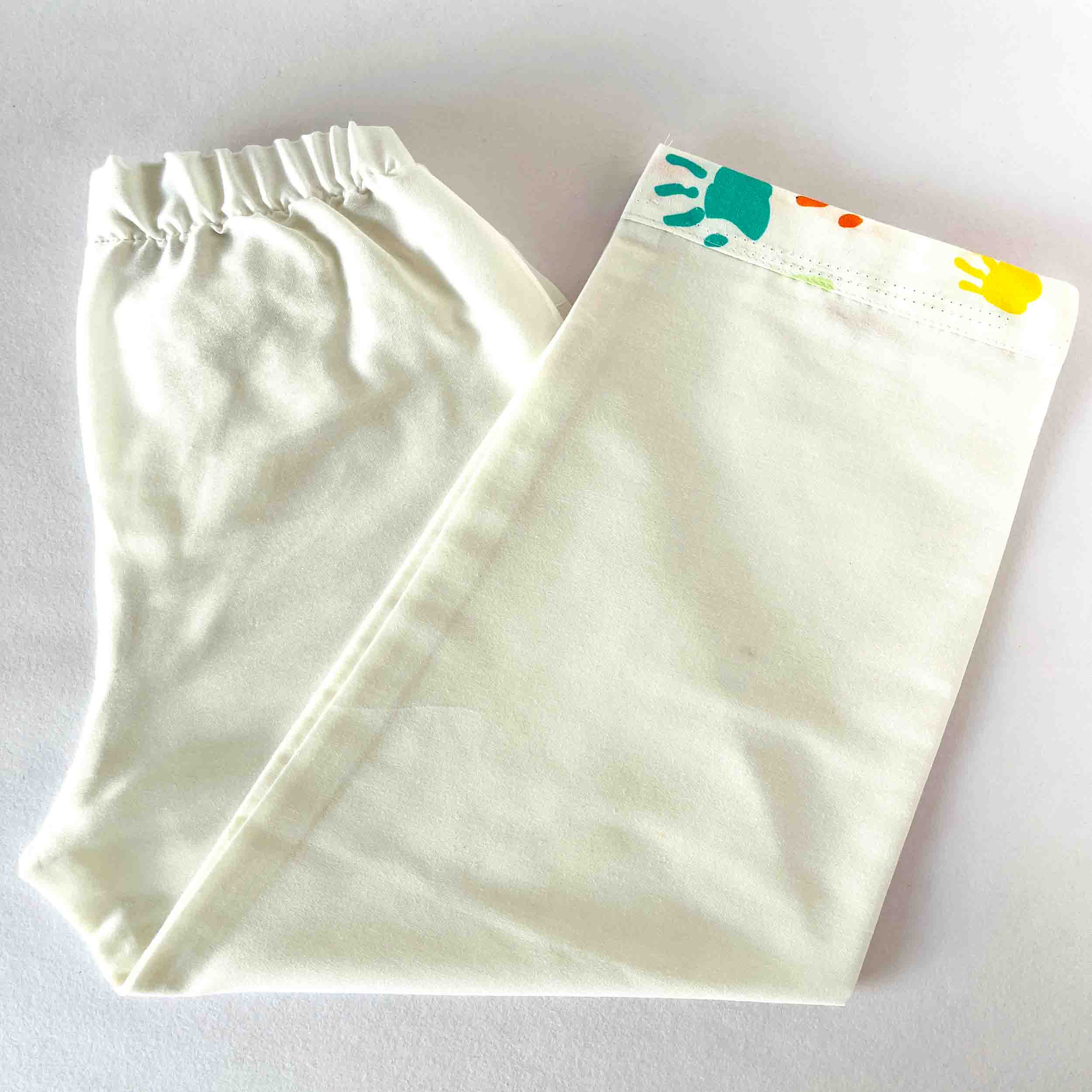Kids cotton white pajama pants with elastic waist soft breathable nightwear bottom with subtle handprint detail for boys and girls Holi outfit
