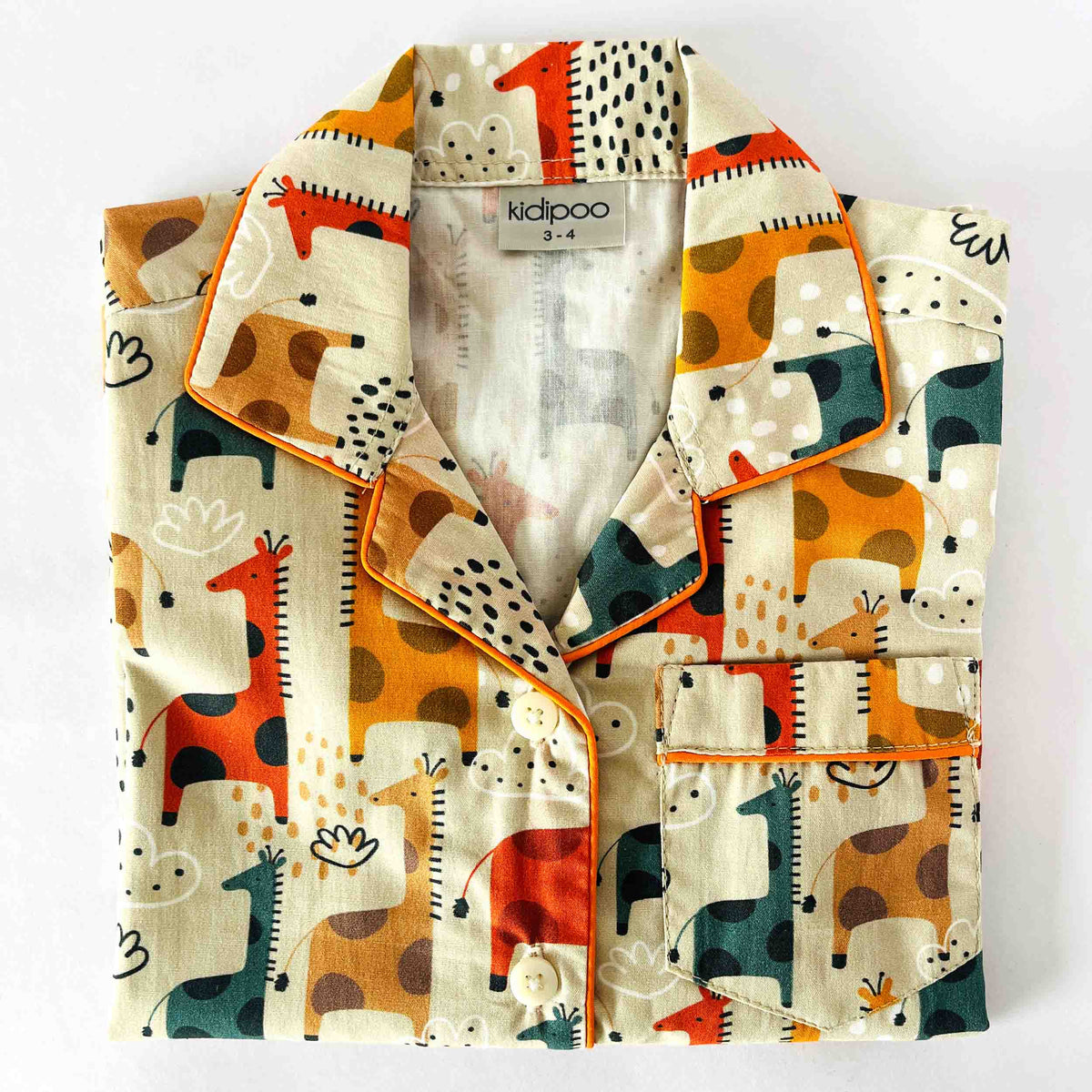 Children's pajama set with animal pattern on a white background