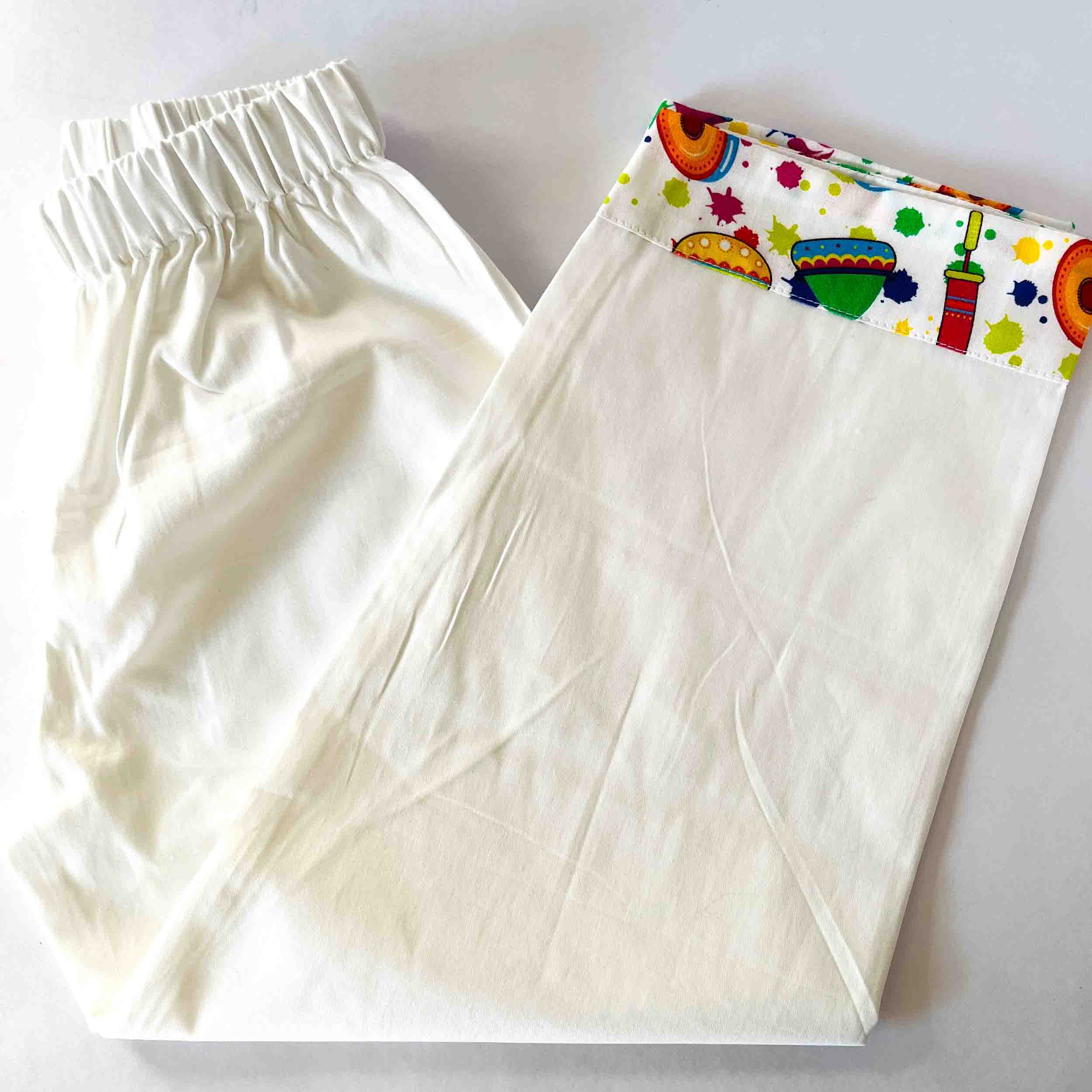 White pants with colorful border on a white background