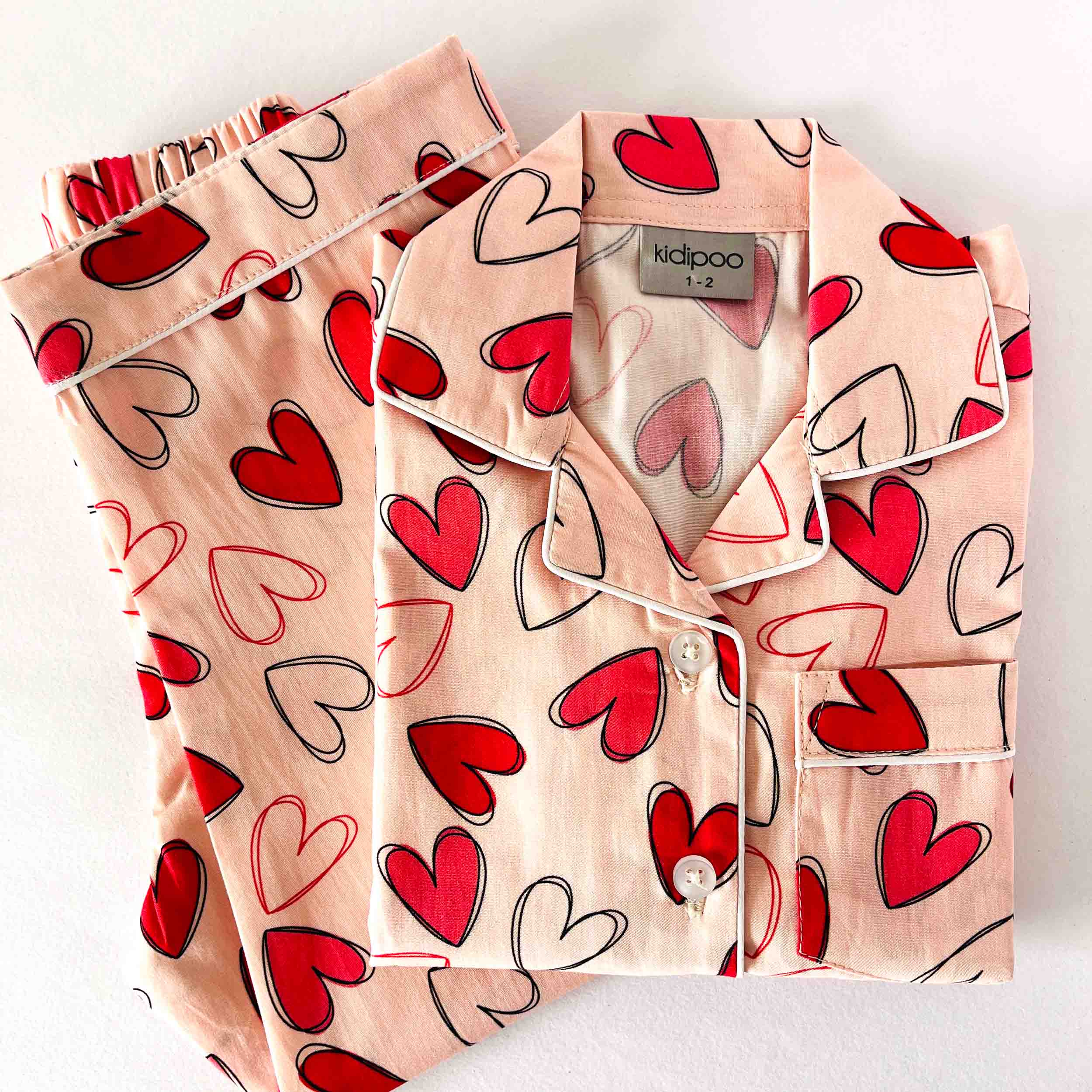 red hearts print kids night suit soft cotton sleepwear set folded view