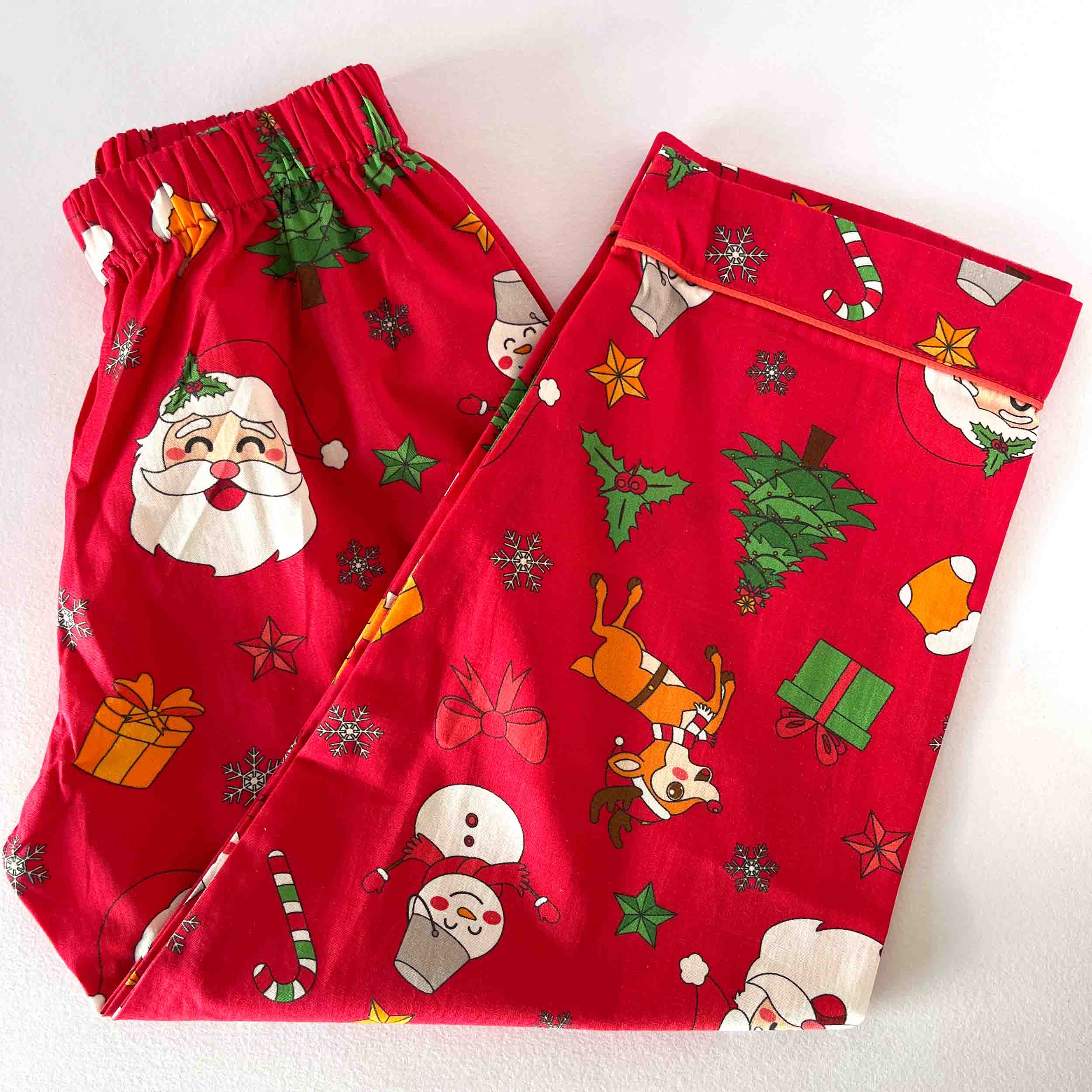 Kids red cotton pajama pants with elastic waist Santa and snowman print soft breathable comfortable Christmas nightwear