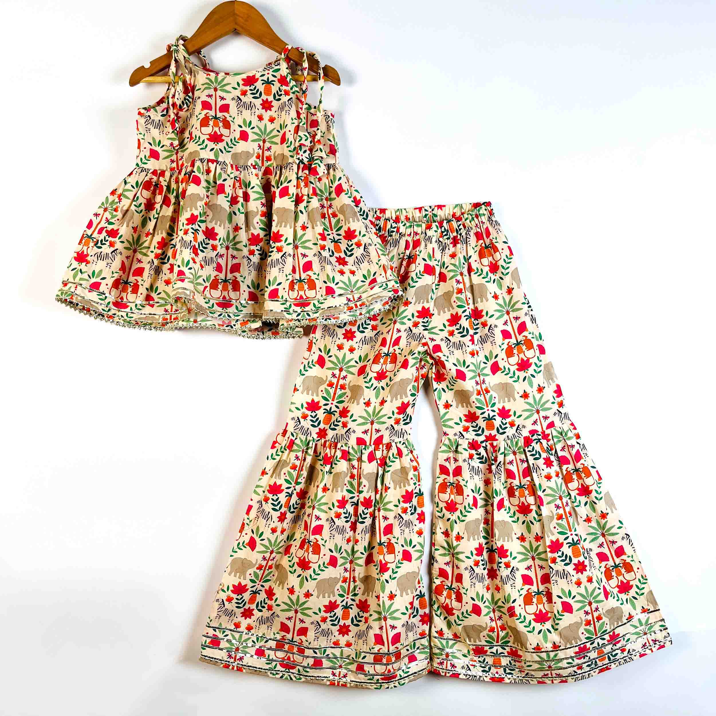 Girls Royal Safari printed cotton sleeveless kurti with matching sharara set in beige floral print
