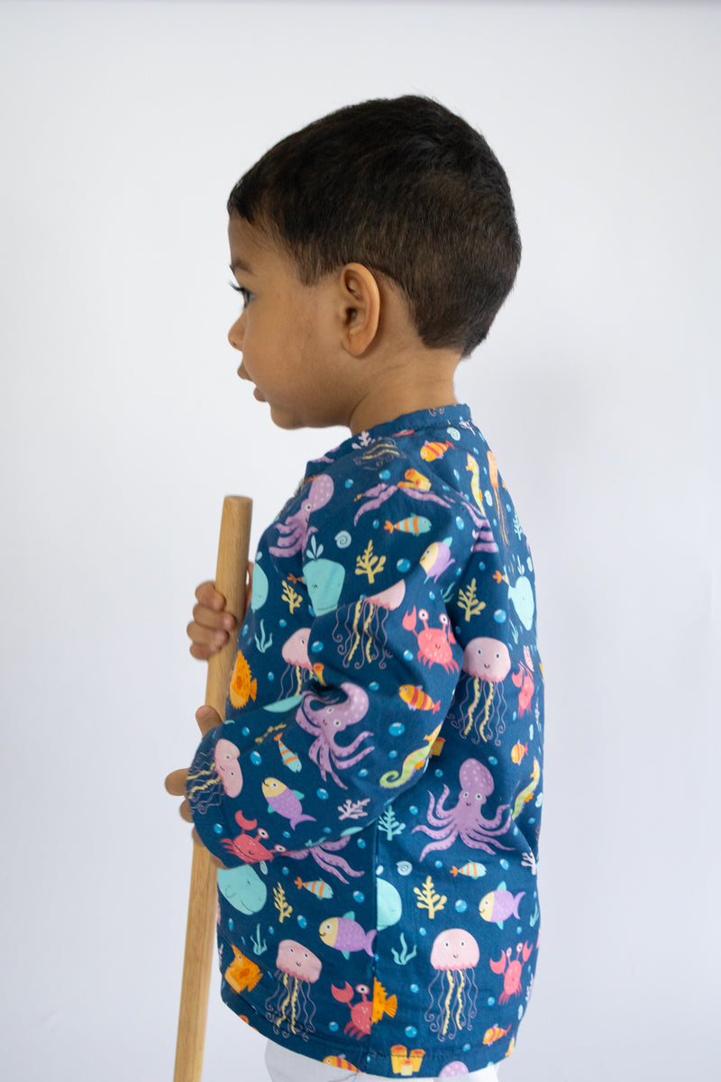 "Kid wearing Kidipoo sea creatures print cotton kurta pajama set side view kids outfit"