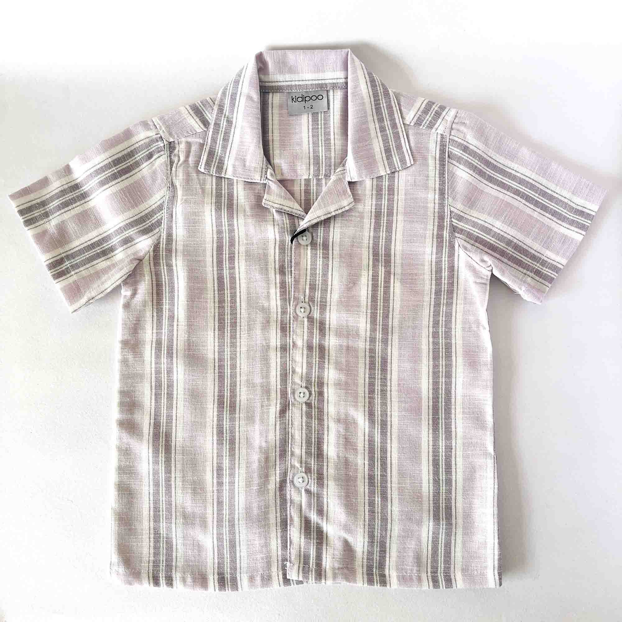 Striped shirt with a brand label on a white background