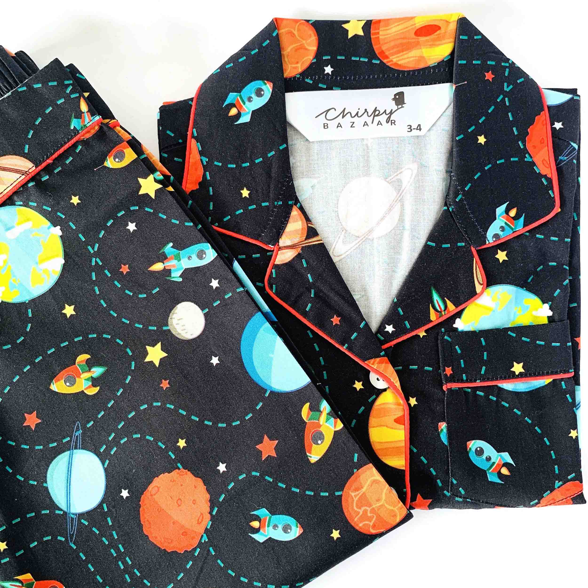 Kids black space print cotton pajama pants with elastic waistband soft breathable sleepwear bottom for boys and girls