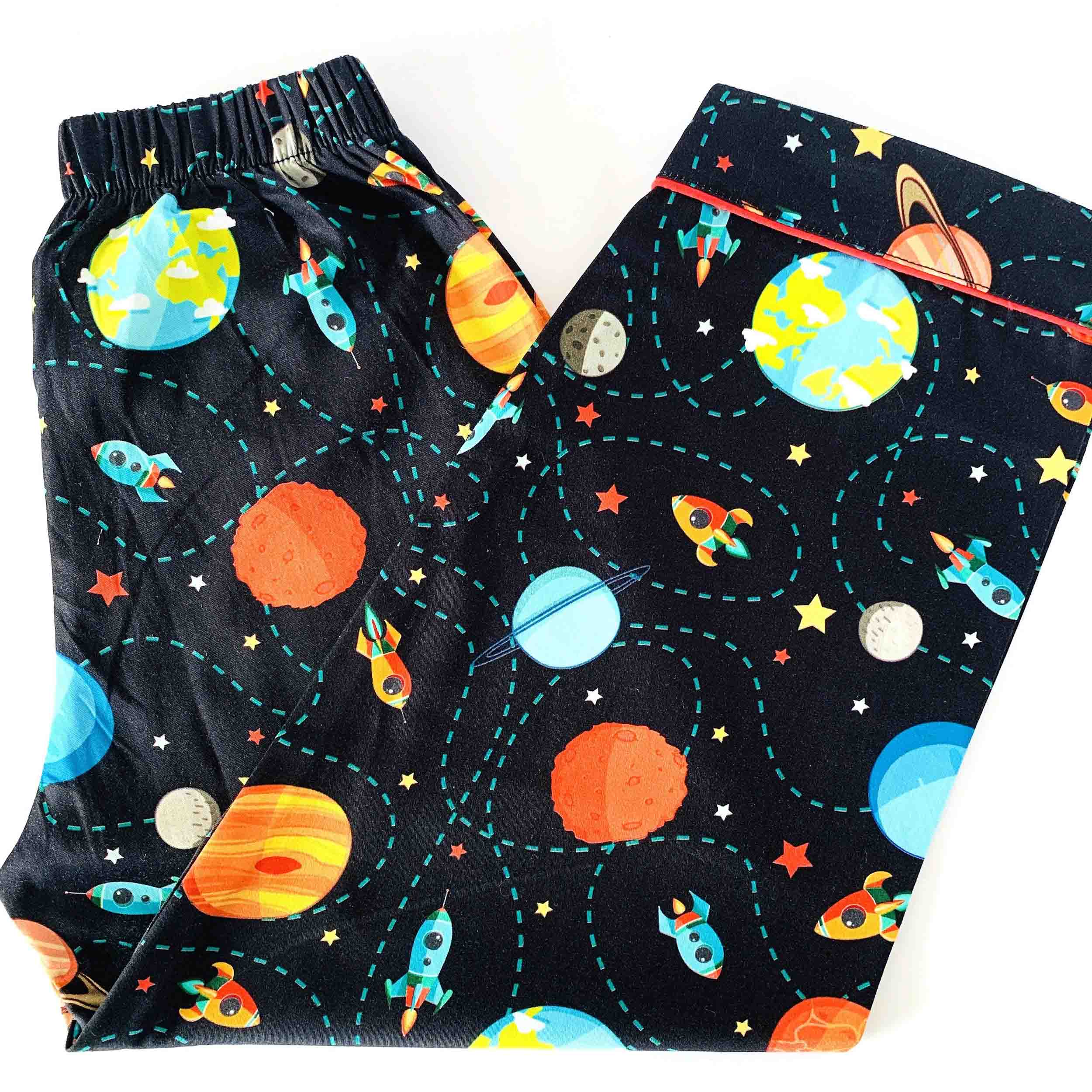 Kids black space print cotton pajama pants with elastic waistband soft breathable sleepwear bottom for boys and girls