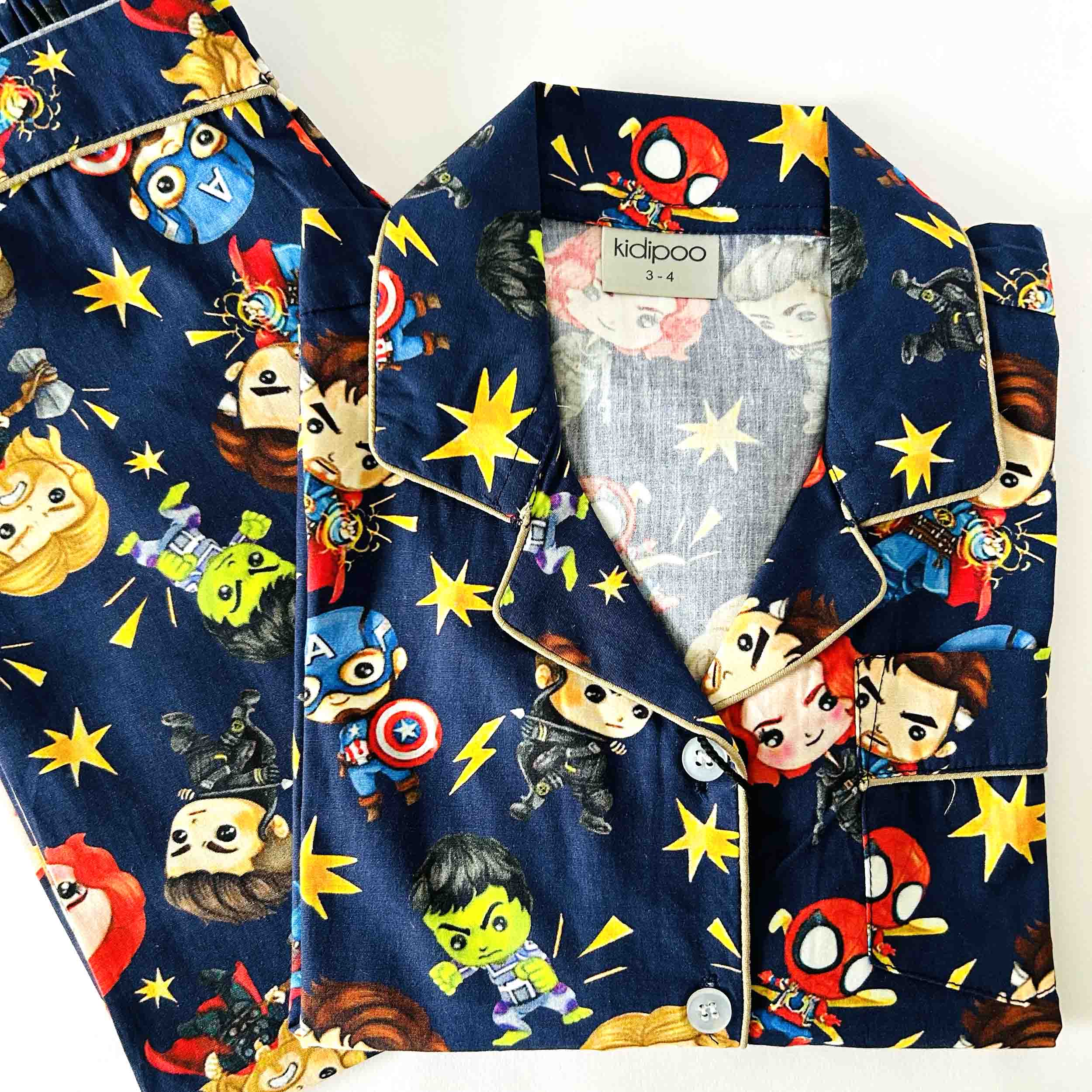 Kids navy blue superhero print cotton night suit with button-down shirt and pajama set, soft breathable cartoon sleepwear for boys and girls.