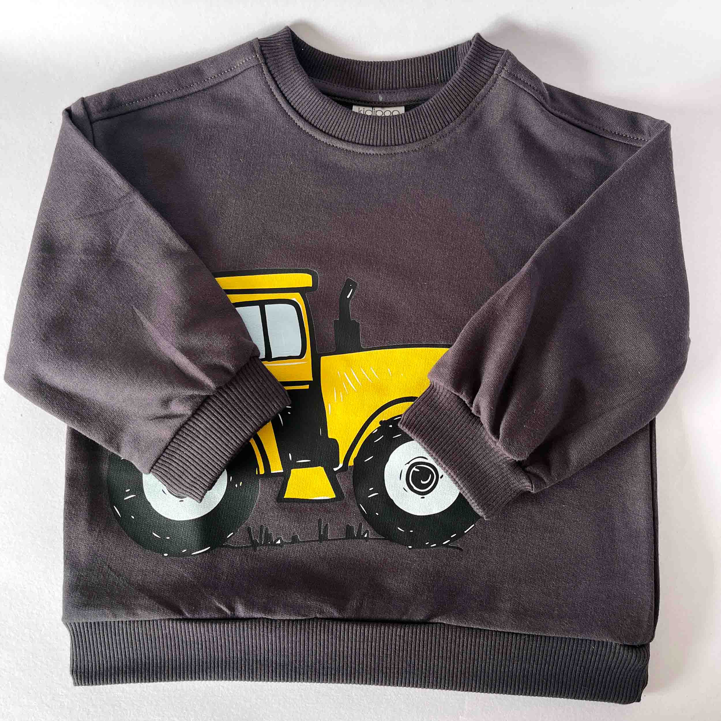 Gray sweatshirt with a yellow tractor design on a white background