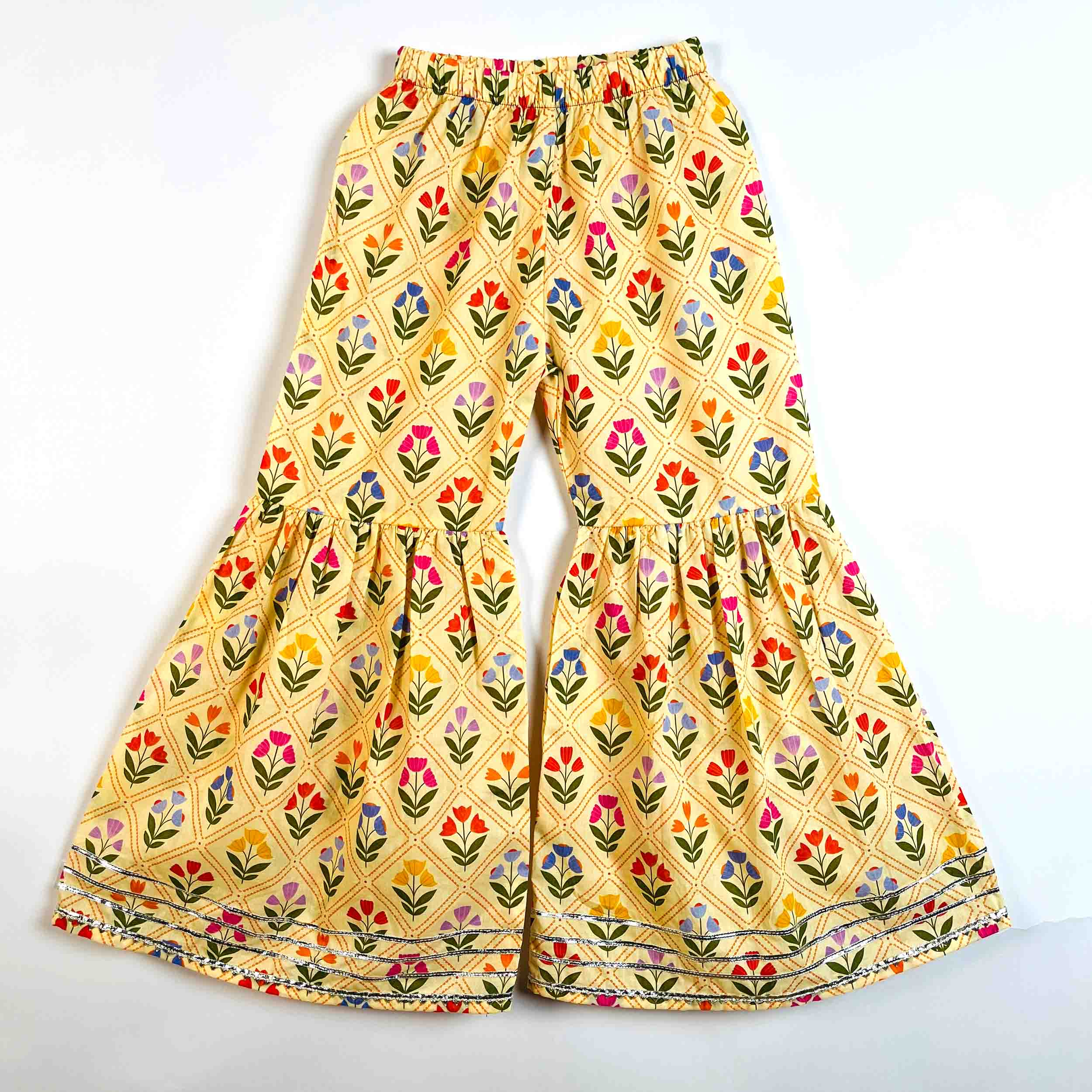 Girls Yellow Petals printed cotton sharara pants with elastic waistband and floral print