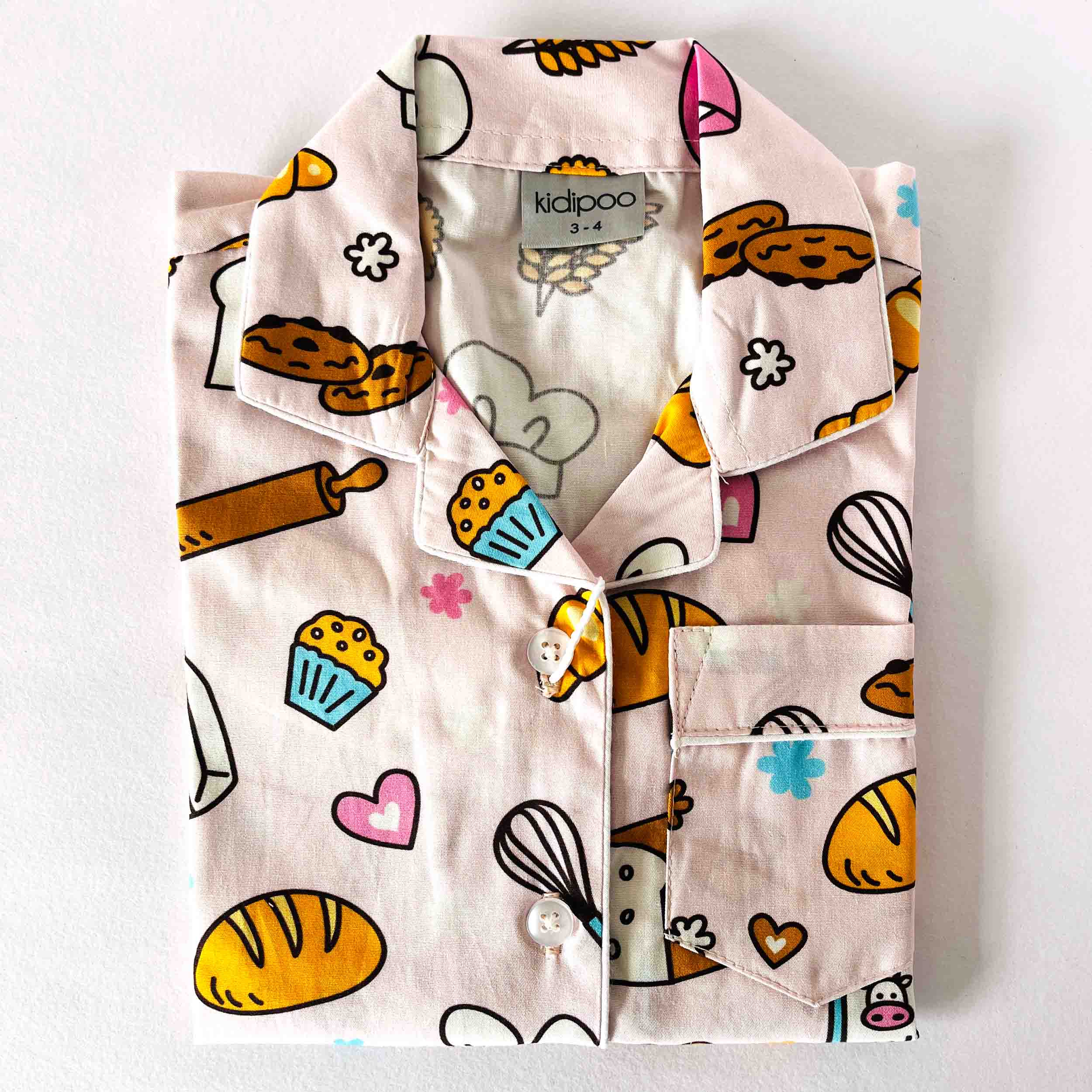 Soft cotton kids night shirt with cute bakery print and long sleeve button-down style 