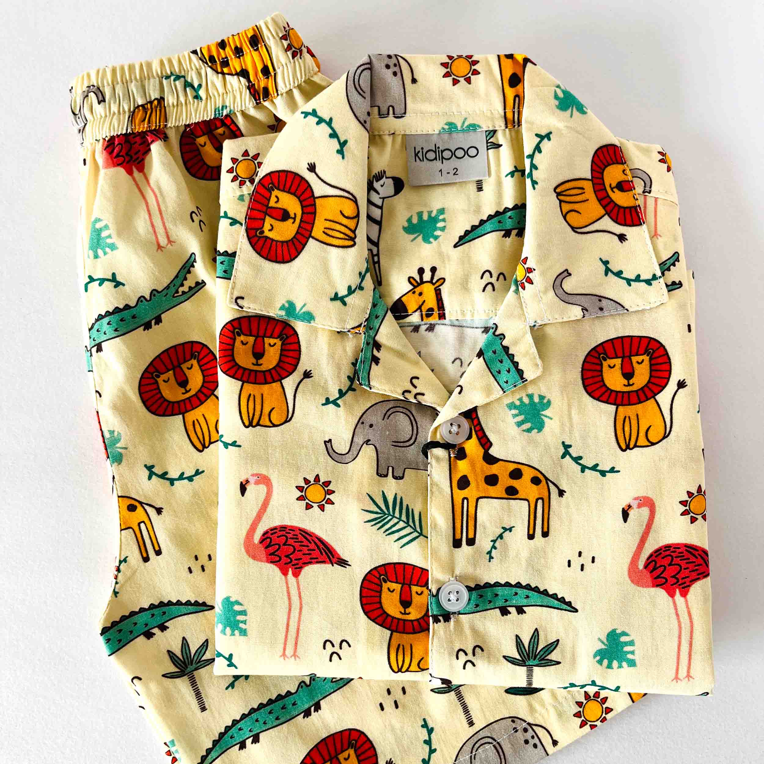 Children's pajama set with animal pattern on a white background