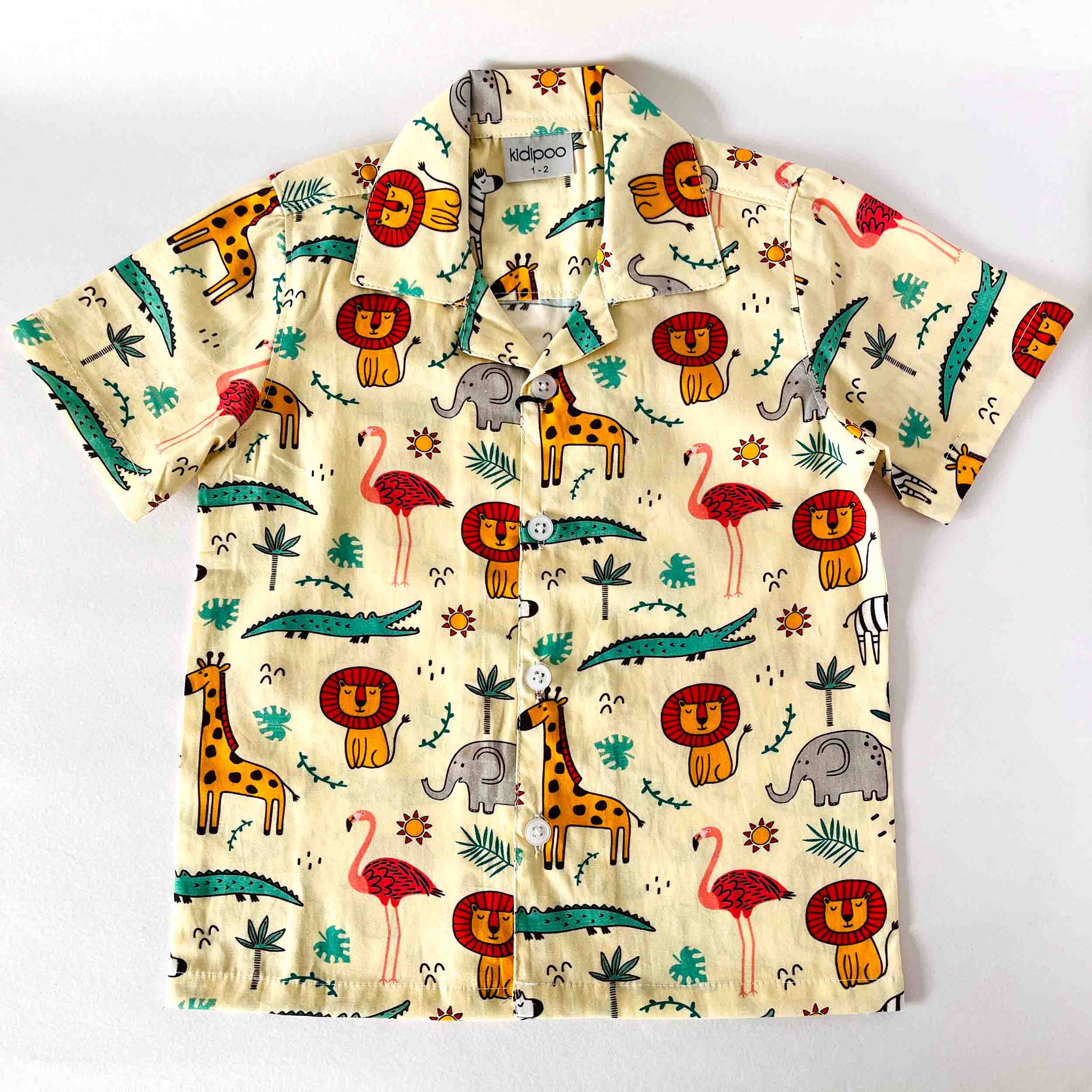 Children's shirt with colorful animal pattern on a white background