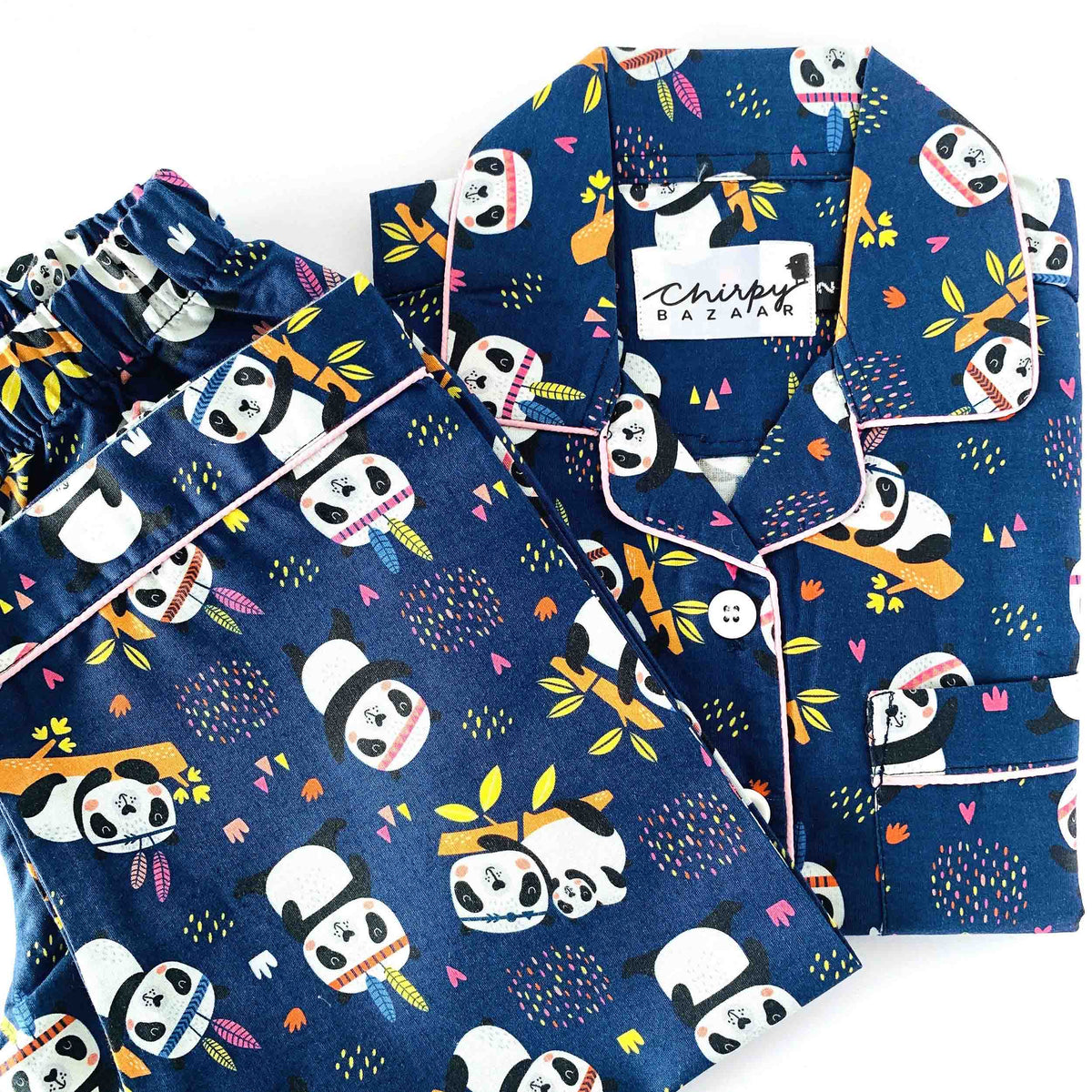 Children's pajama set with panda design on a white background