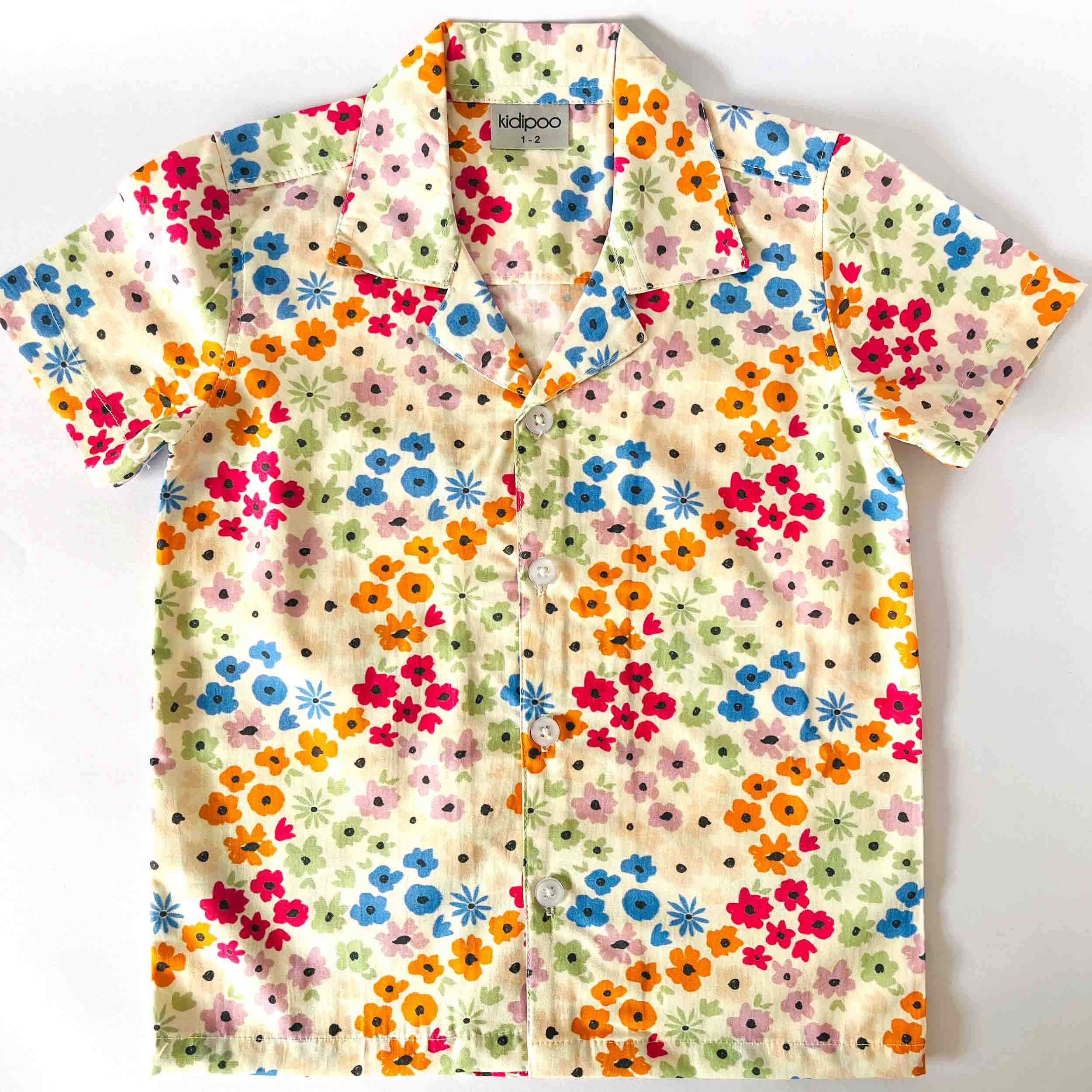 Kids cotton shirt with colorful floral print and half sleeve front button style