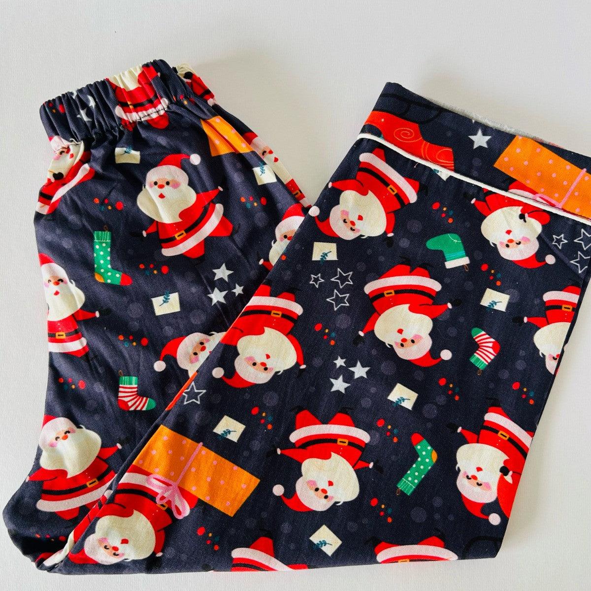 Kids navy blue Santa print cotton pajama with elastic waist soft comfortable sleepwear bottom for boys and girls

