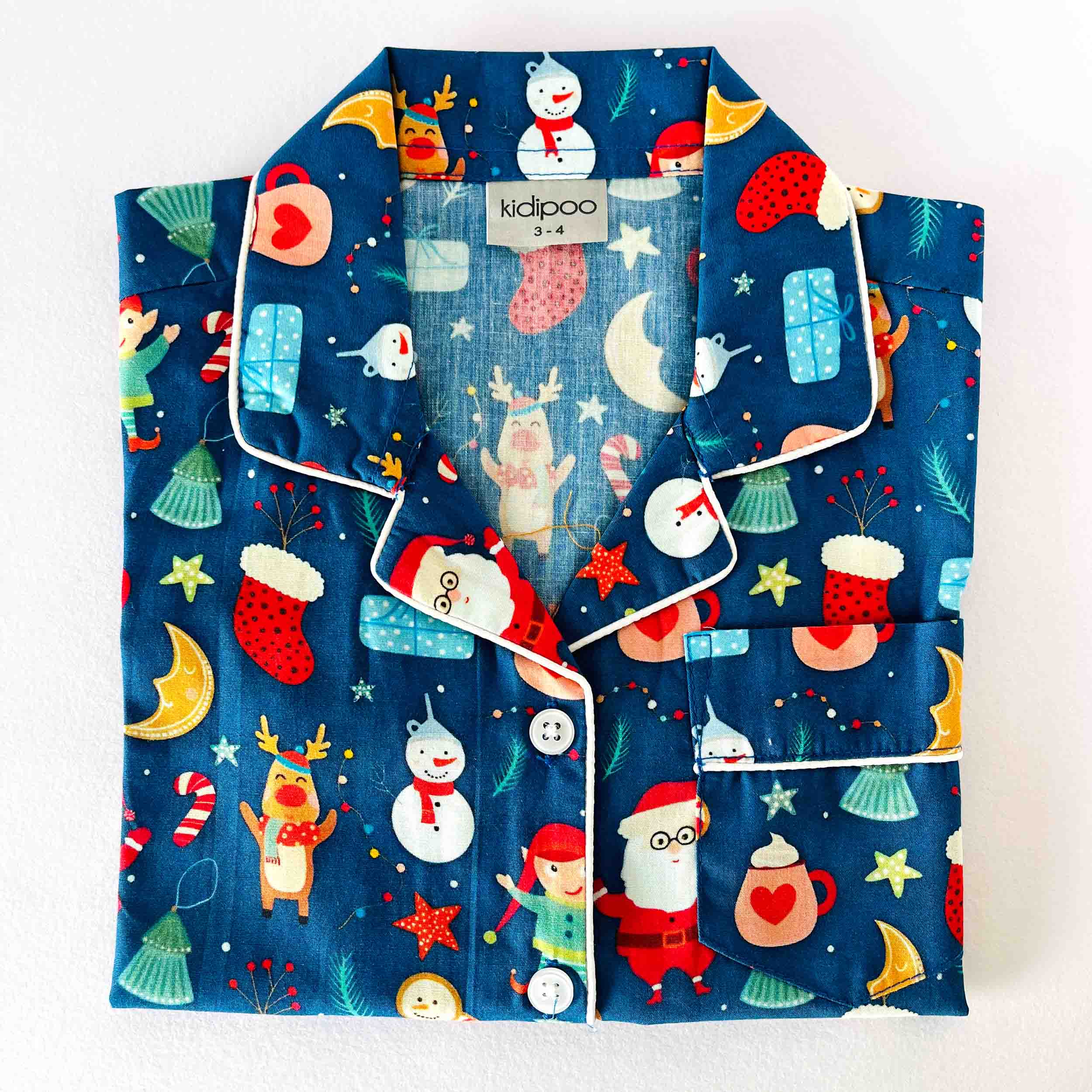 Kids dark blue Christmas print cotton night suit shirt front view festive sleepwear top with Santa design