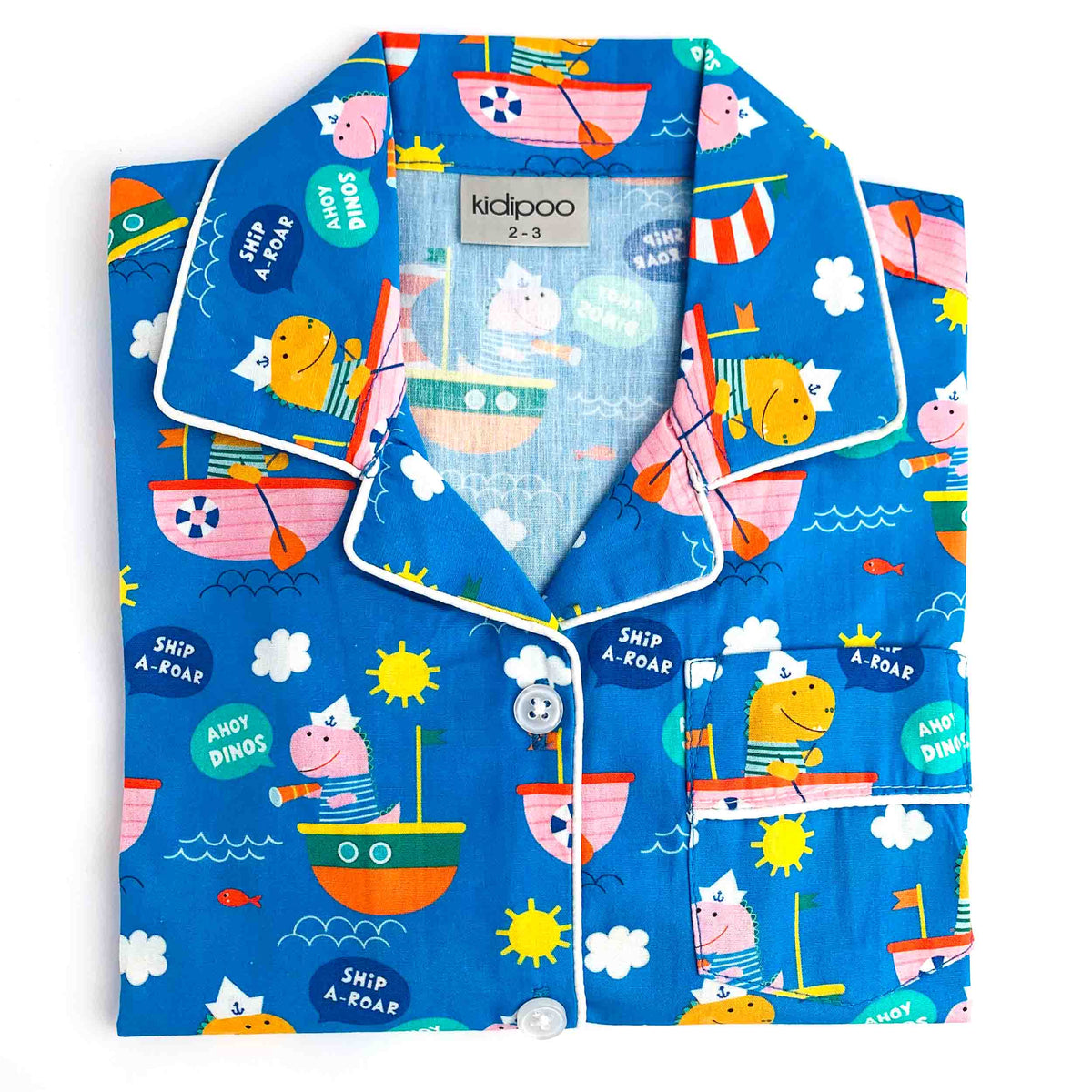 Dino Sailors kids night suit with colorful dinosaur and sailor-themed prints on bright blue fabric, featuring a collared long-sleeve shirt and matching pajama