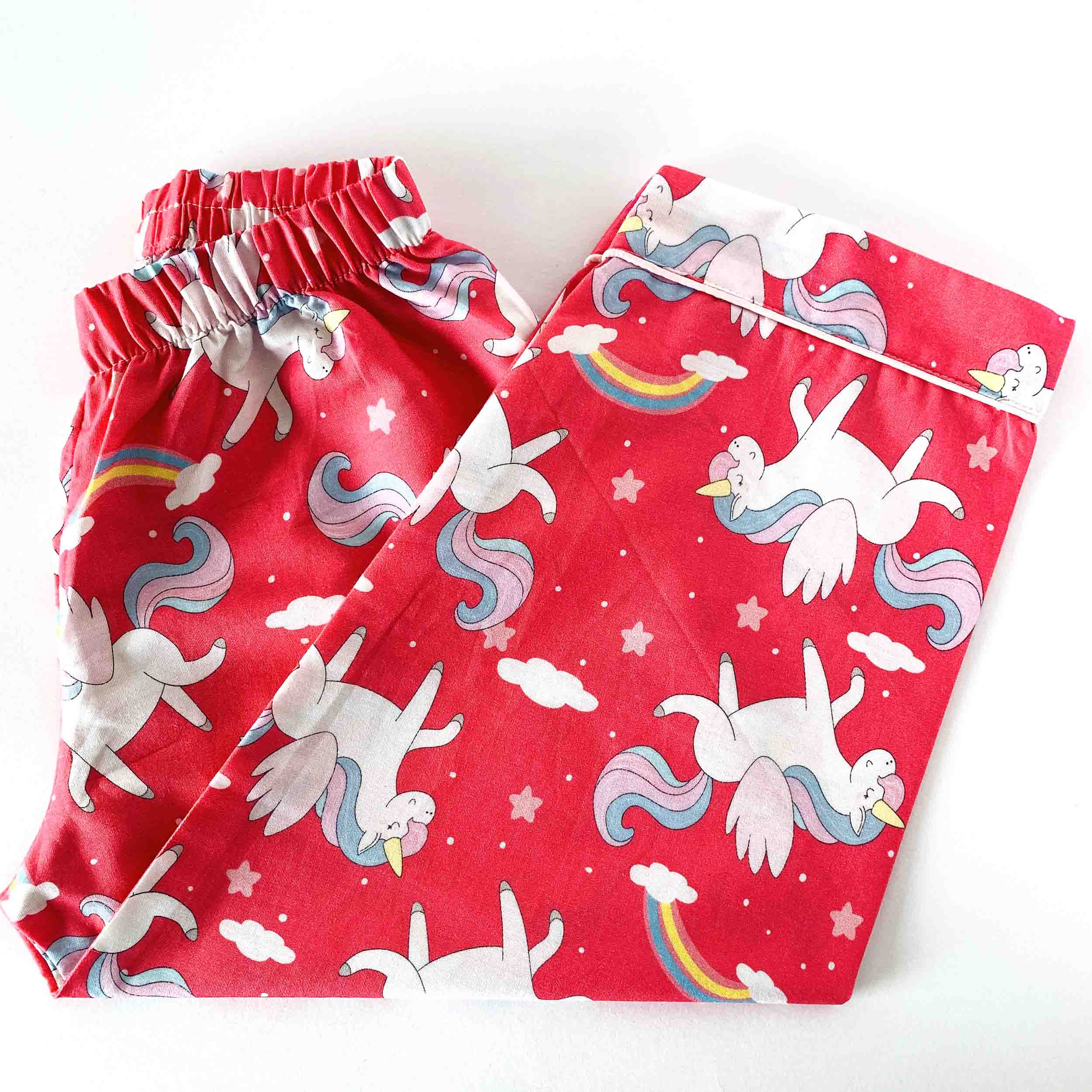 Kids red cotton pajama pants with elastic waist unicorn and rainbow print soft breathable comfortable nightwear bottom for girls