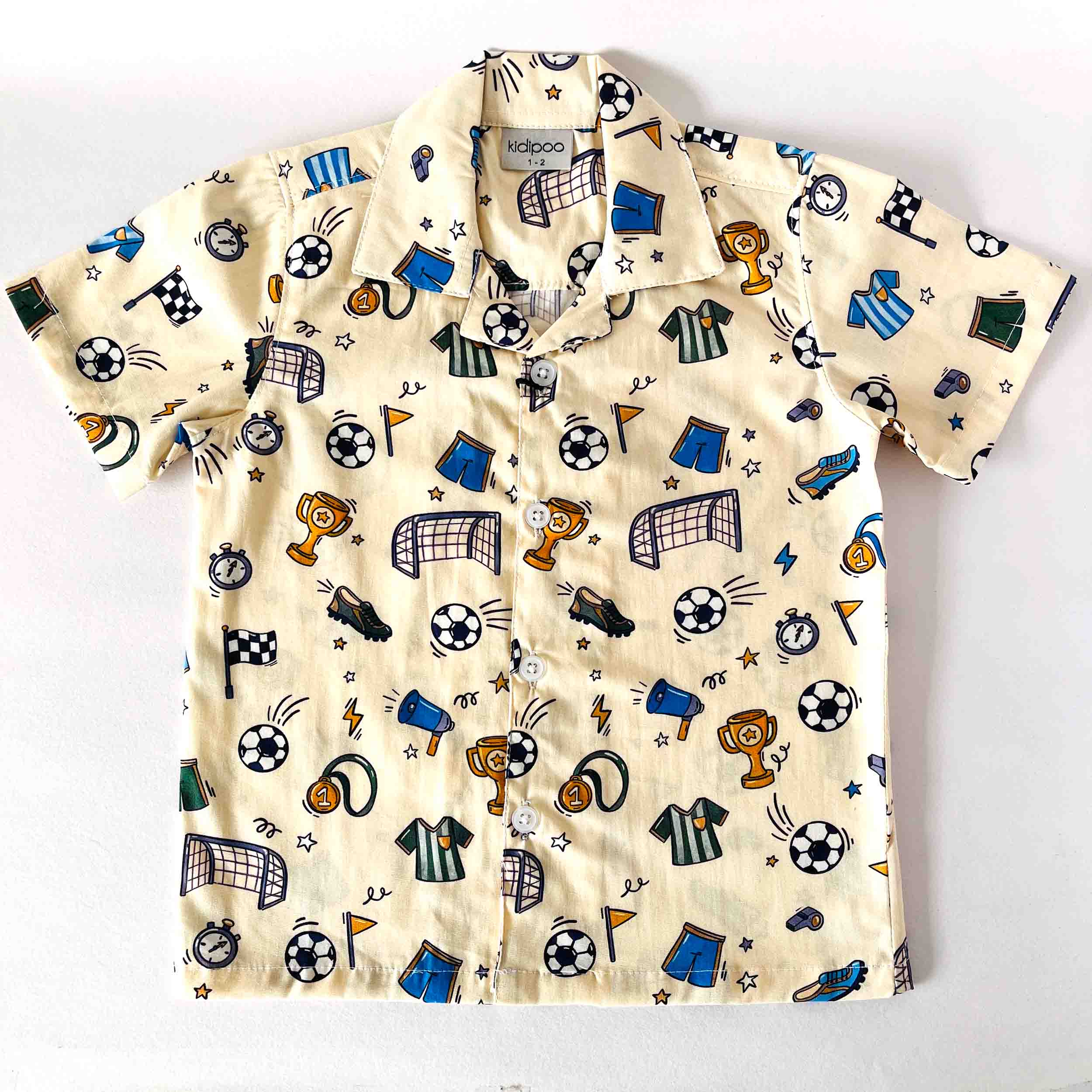 Short-sleeve shirt with sports-themed pattern on a white background
