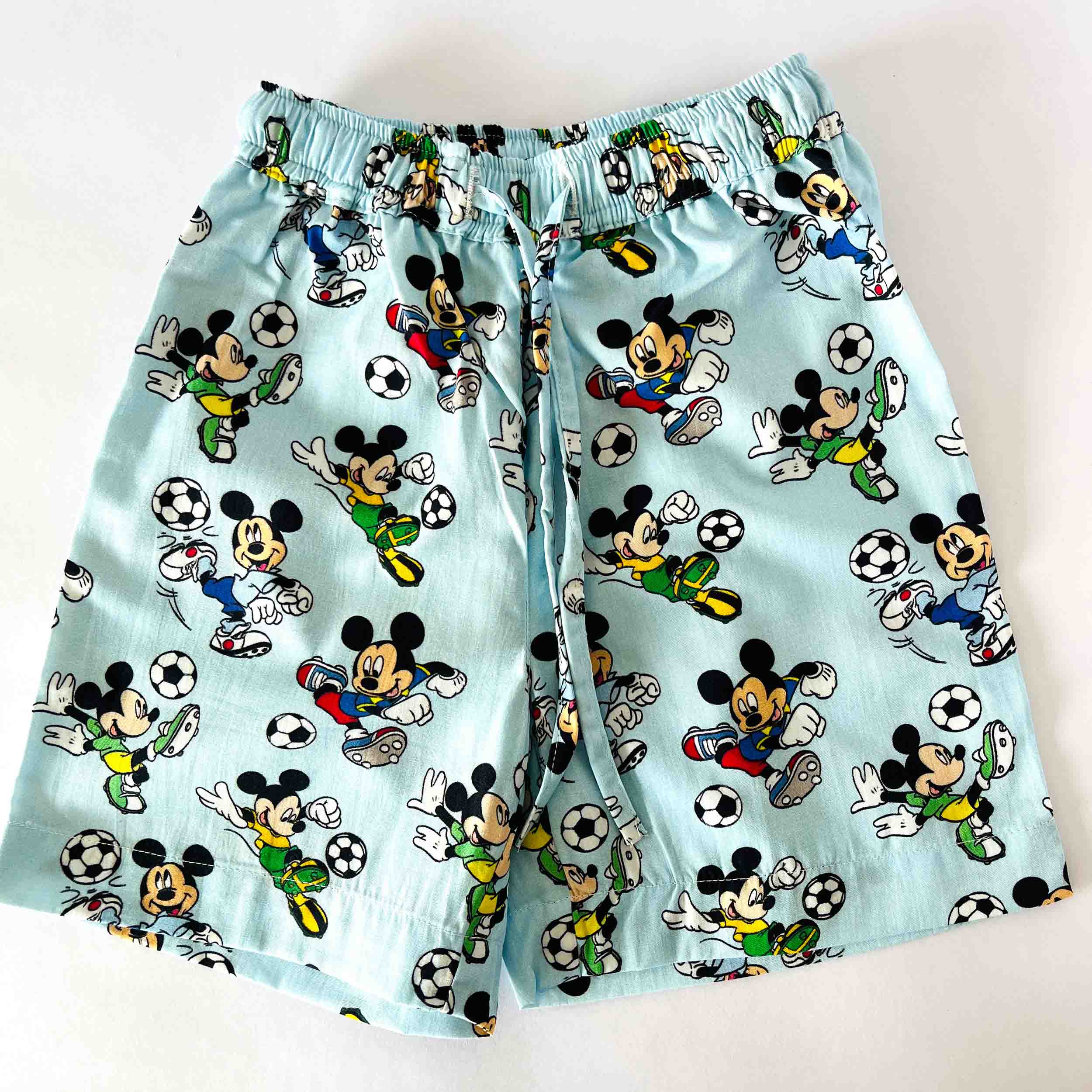 Kids blue shorts with Mickey Mouse football print elastic waist summer wear