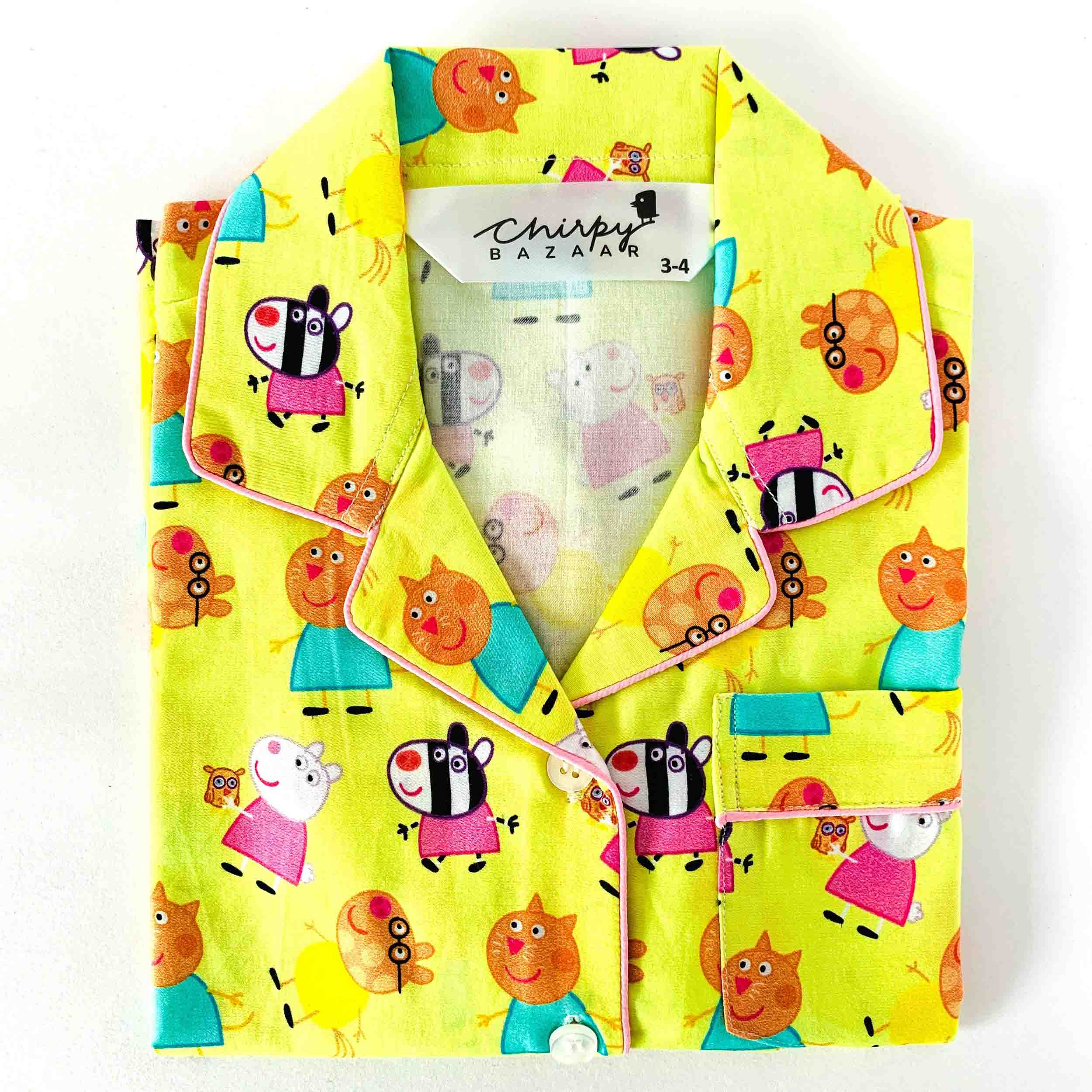 Children's yellow robe with cartoon character print on a white background
