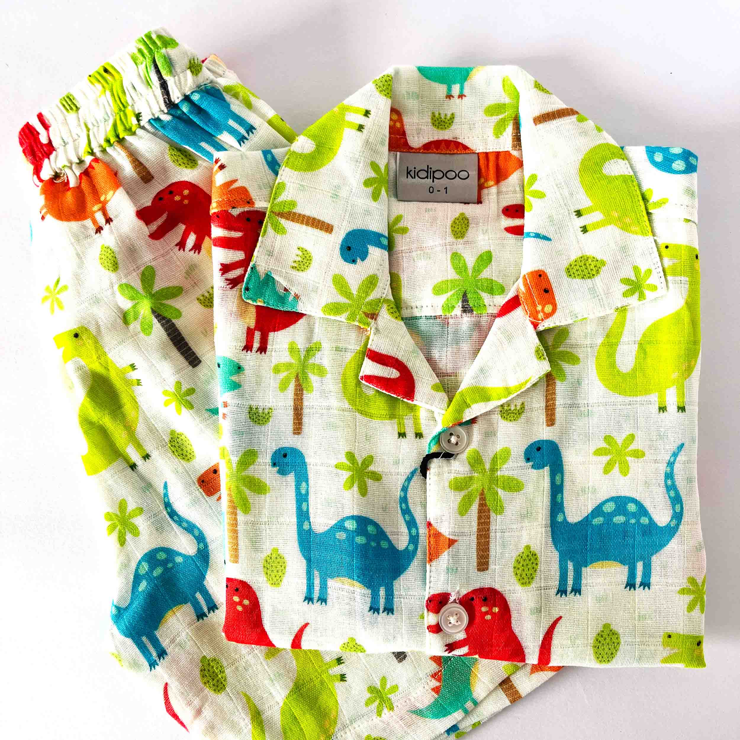  Kids muslin cotton coord set with colorful dinosaur print, front button shirt and elastic waist shorts