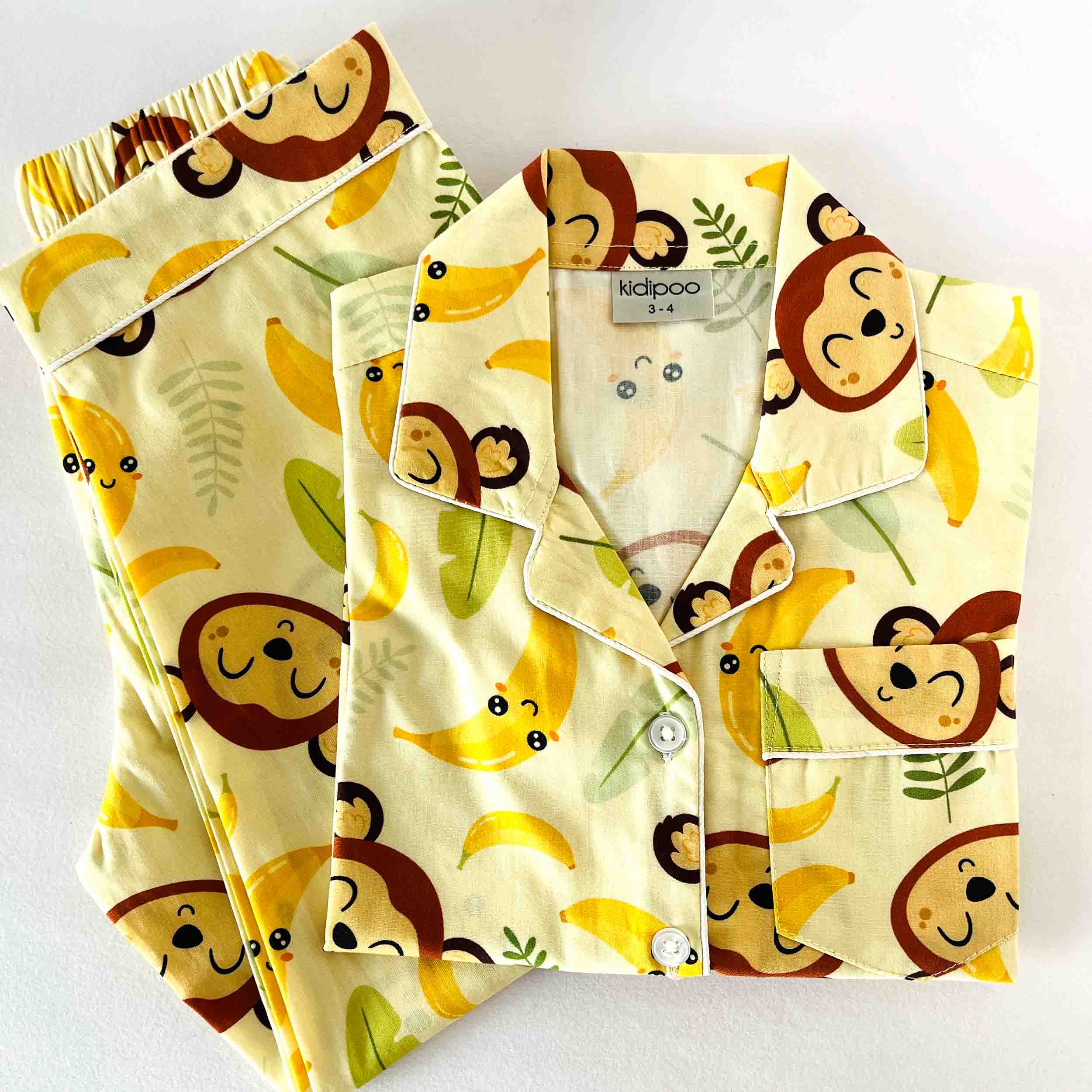 Kids funny monkey print night suit soft cotton playful sleepwear set yellow base 