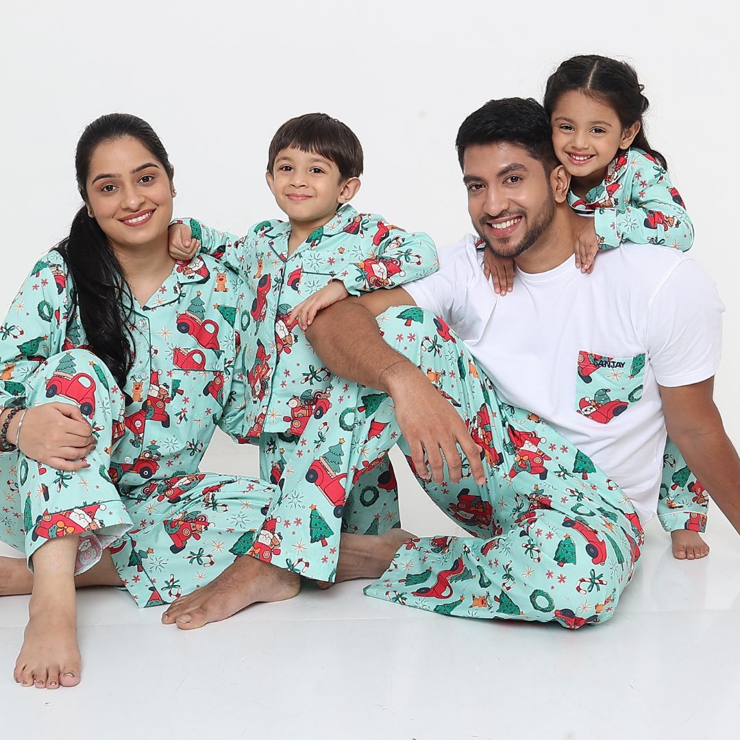 family matching Christmas night suits with green Santa car print cotton sleepwear for parents and kids