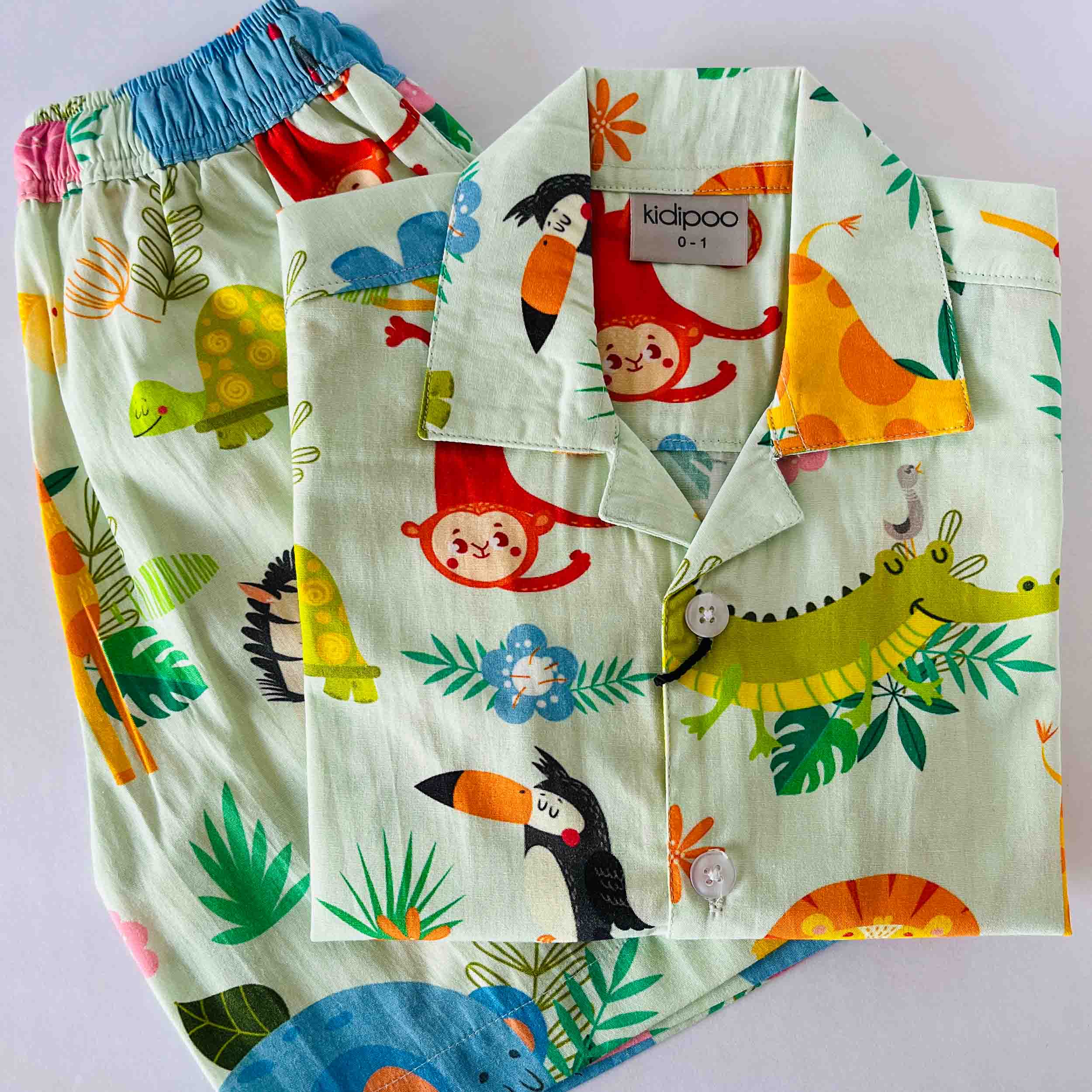 Kids green cotton coord set with jungle animal print half sleeve shirt and shorts breathable comfortable summer outfit for boys and girls