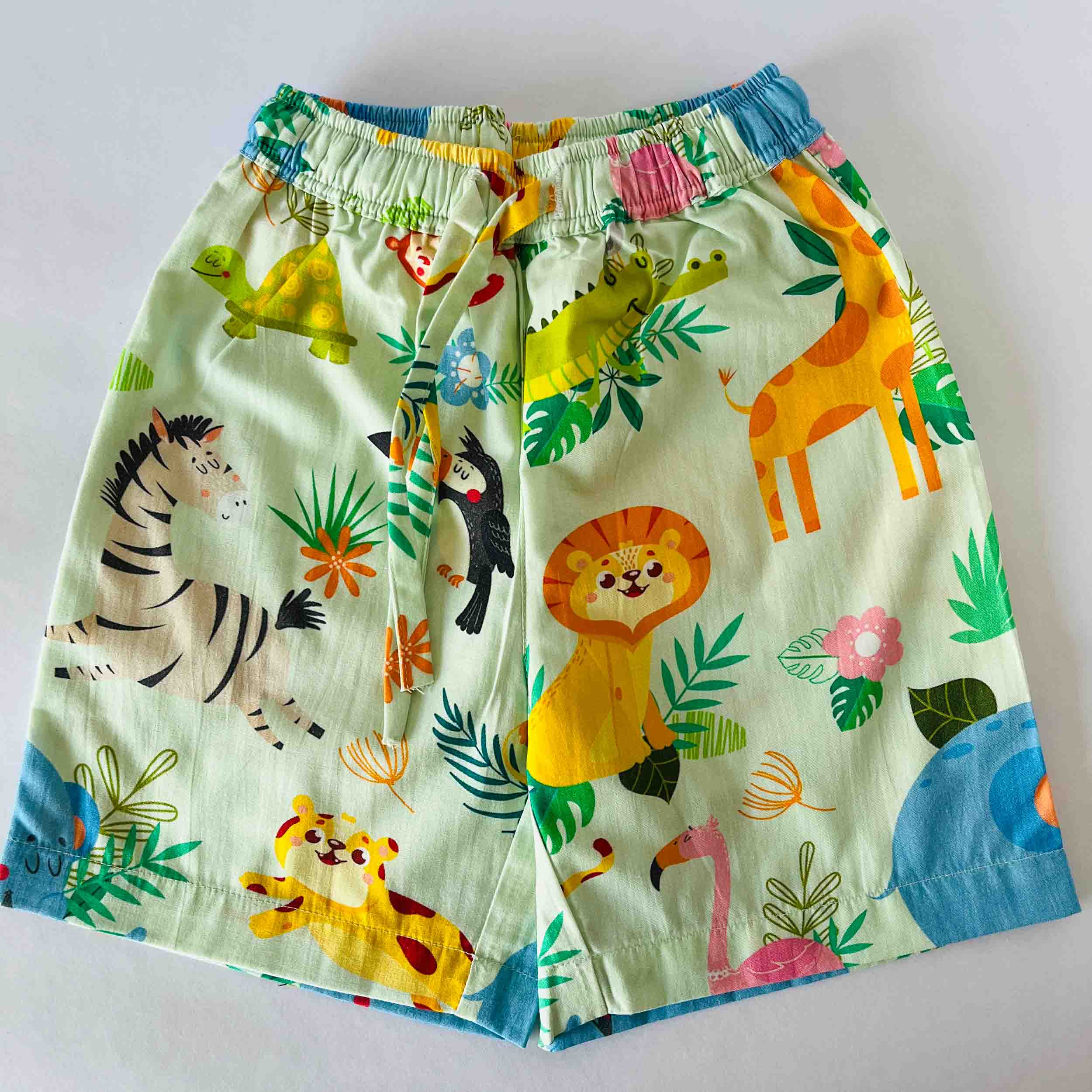 Kids green cotton shorts with elastic waist jungle print soft breathable comfortable summer bottom for boys and girls