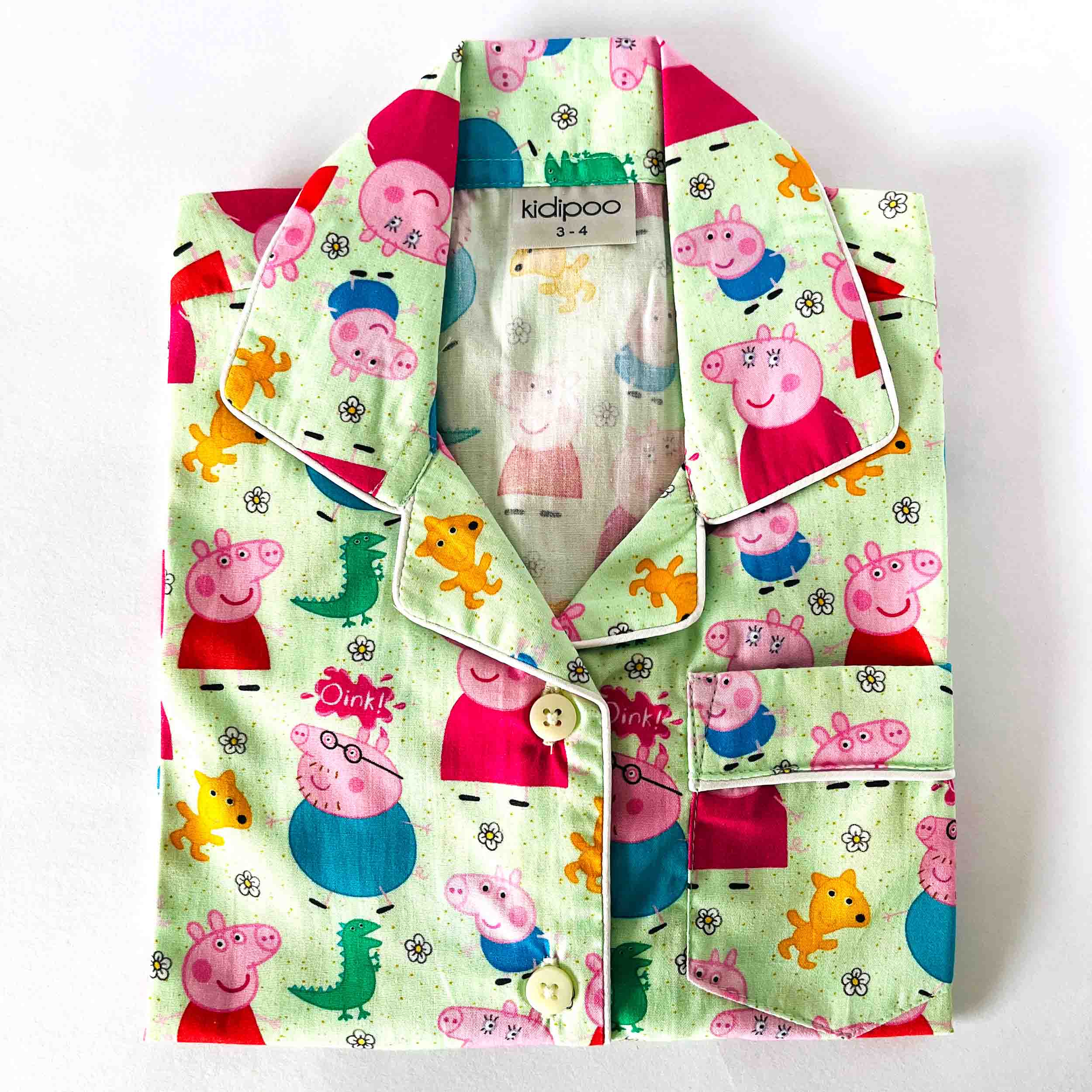 Kids green peppa pig cartoon print night suit shirt front view cotton sleepwear top
