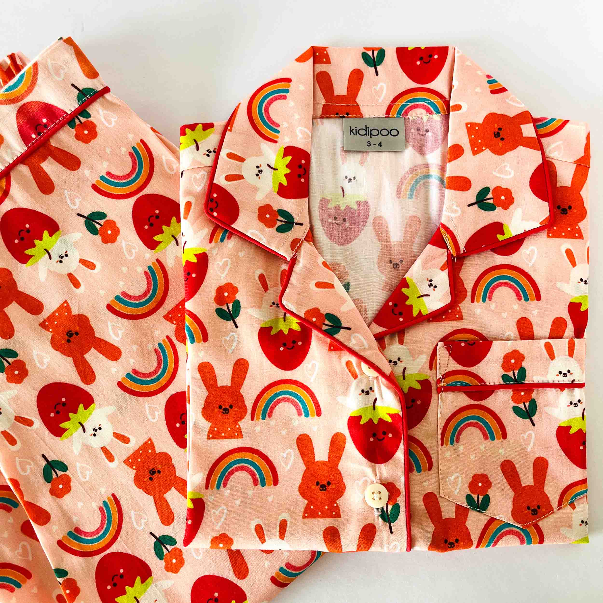 Kids cartoon bunny print cotton night suit set with long sleeve button-down shirt and elastic waist pajama soft breathable sleepwear front view