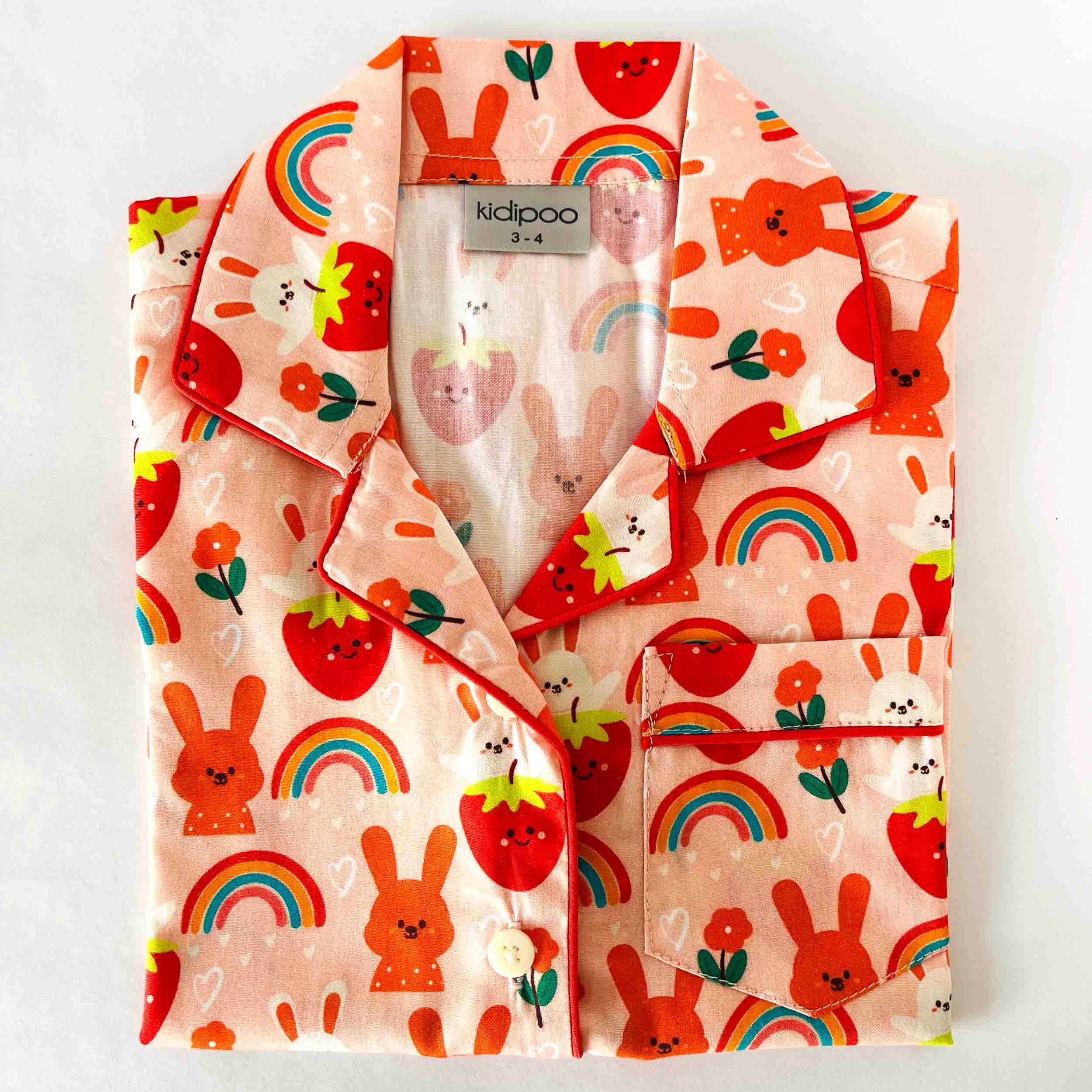 Kids bunny print cotton night suit close-up of long sleeve button-down shirt with colorful cartoon pattern soft breathable fabric