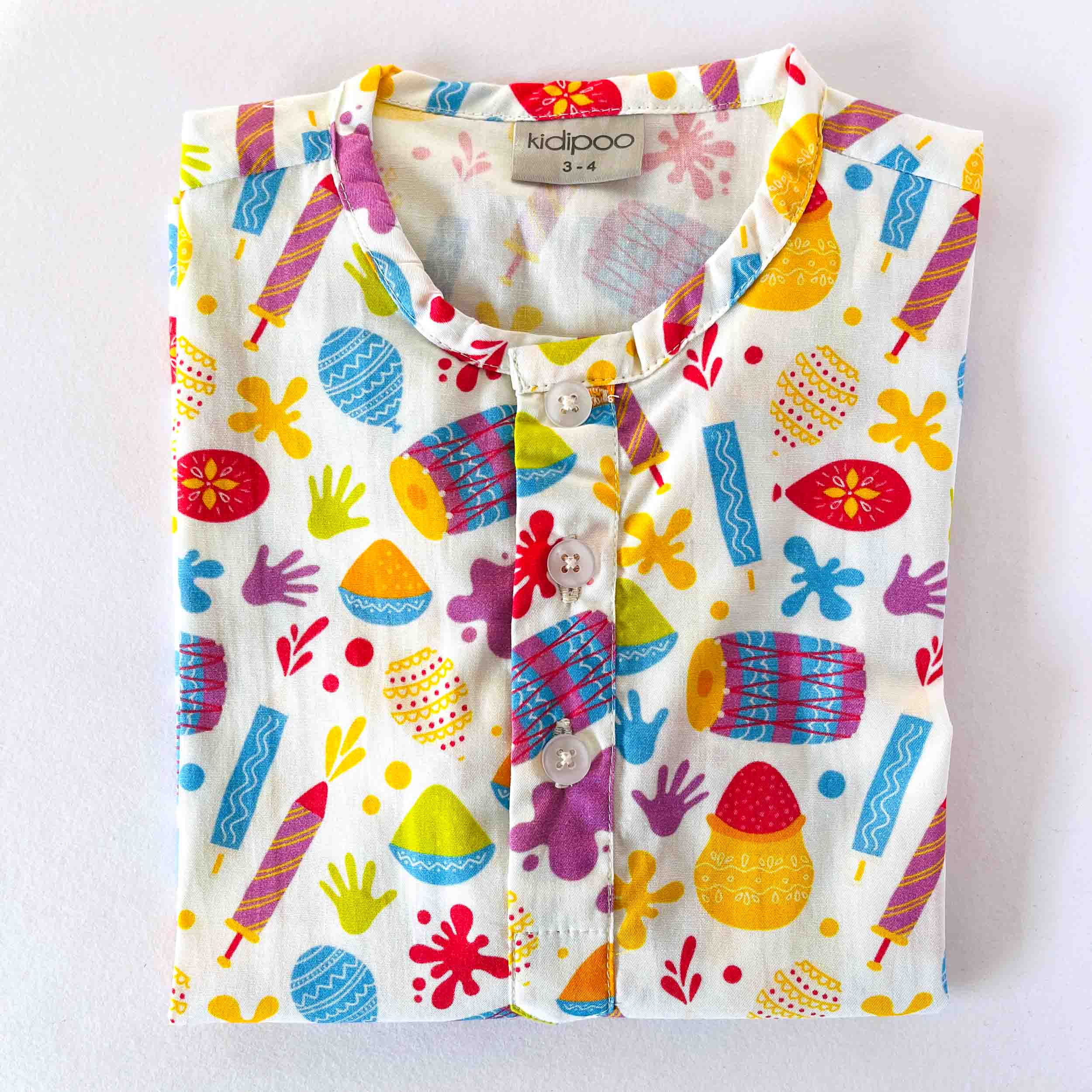 Colorful children's cardigan with ice cream and flower pattern on a white background