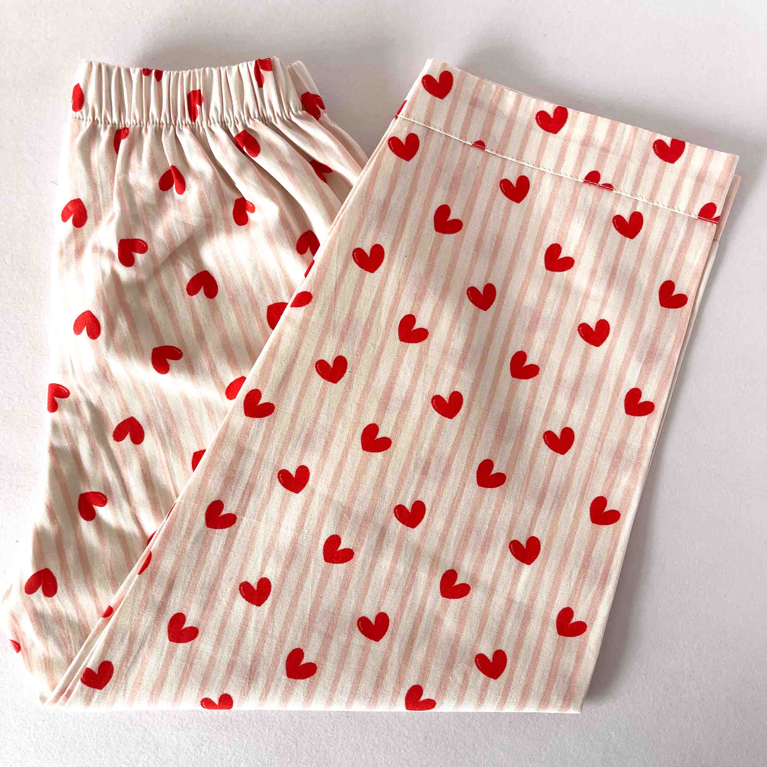 Kids pink cotton pajama pants with red heart print elastic waist soft breathable sleepwear
