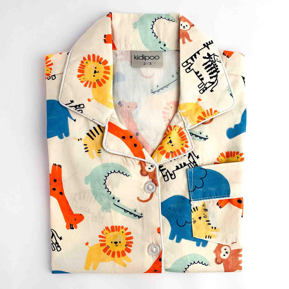 Jungle Friends printed kids night suit featuring colorful lions, giraffes, dinosaurs and jungle animals on cream fabric