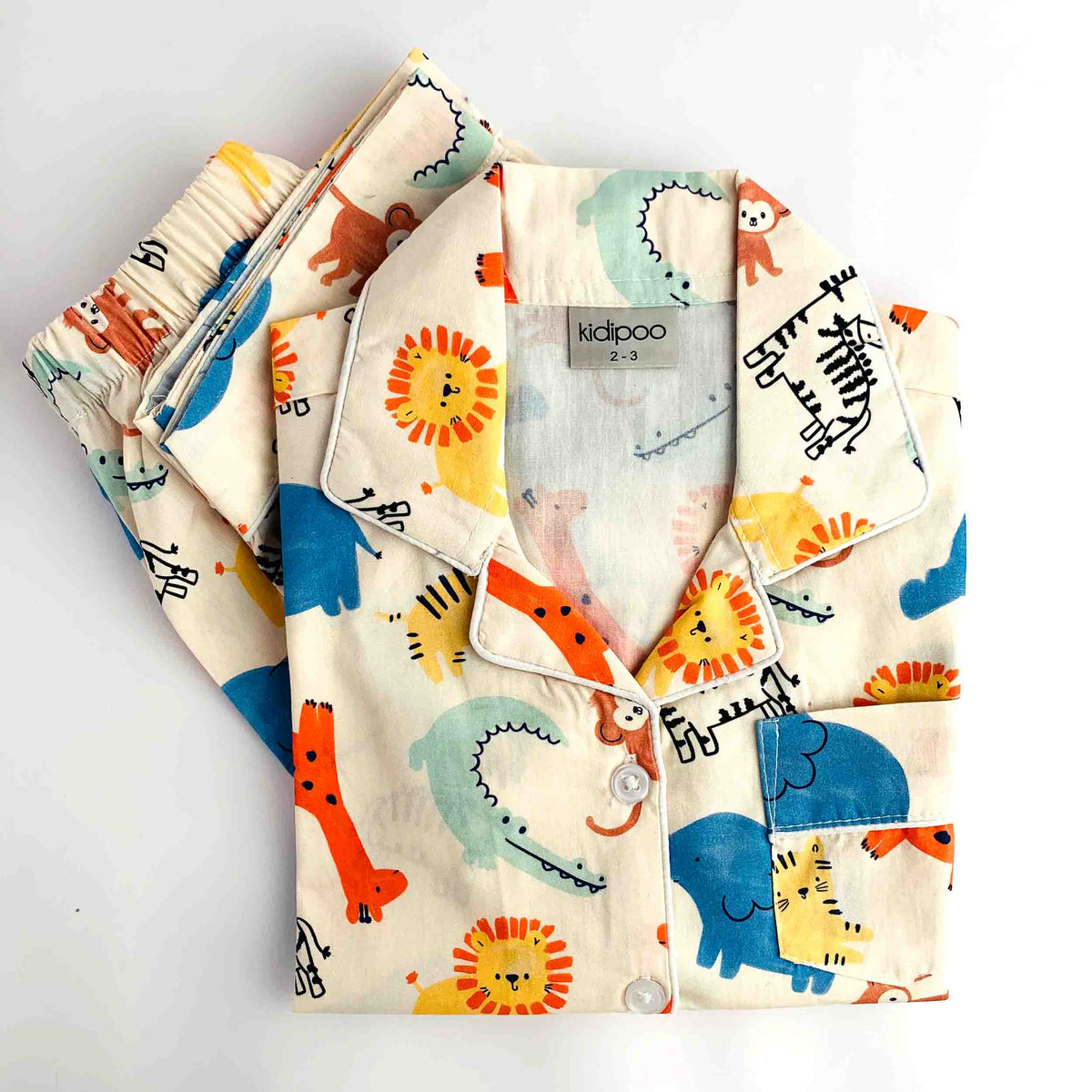 Jungle Friends kids night suit with colorful jungle animal prints, collared shirt and matching pajama in soft cream fabric