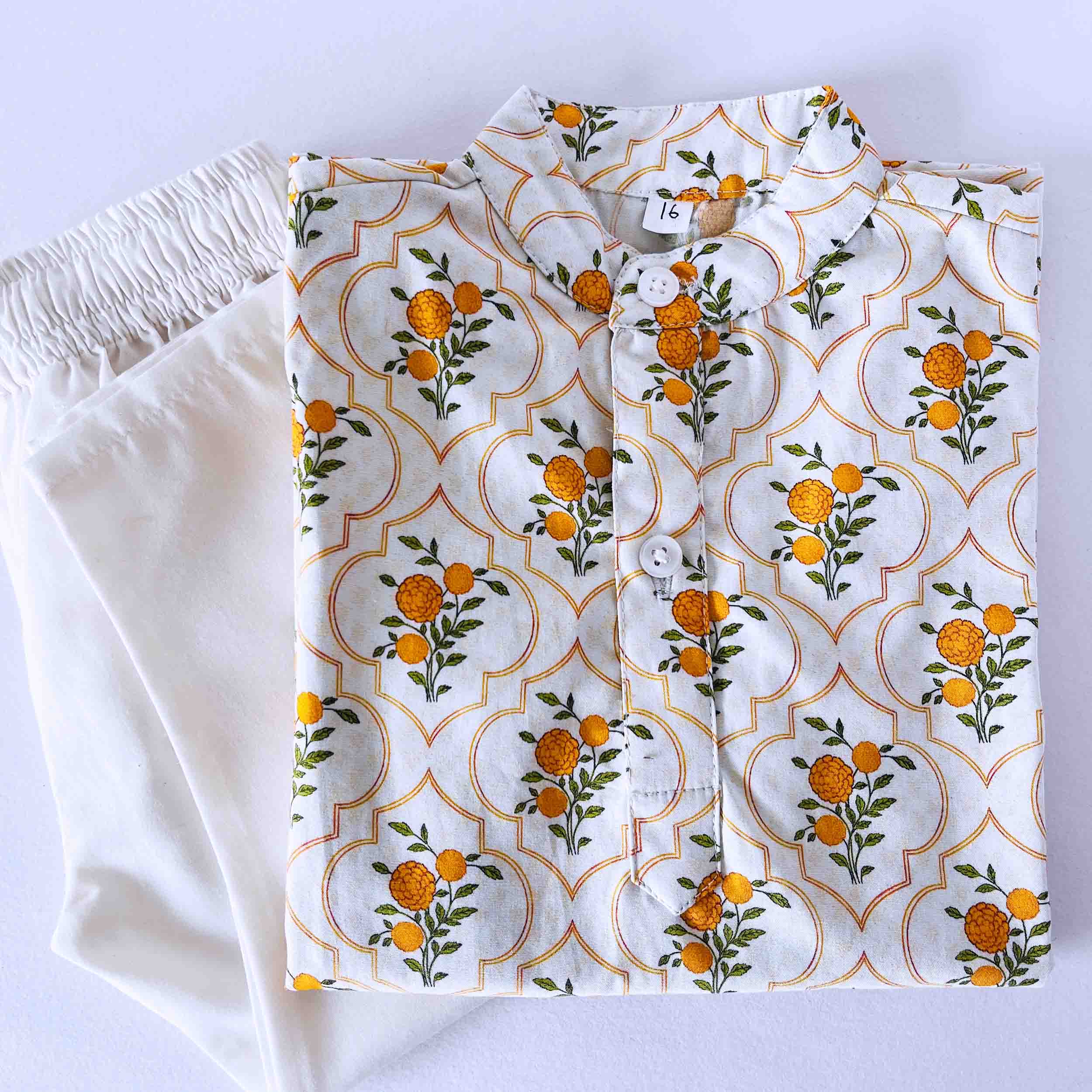 Kids marigold floral cotton kurta pajama set with long sleeve kurta and elastic waist white pajama breathable ethnic wear