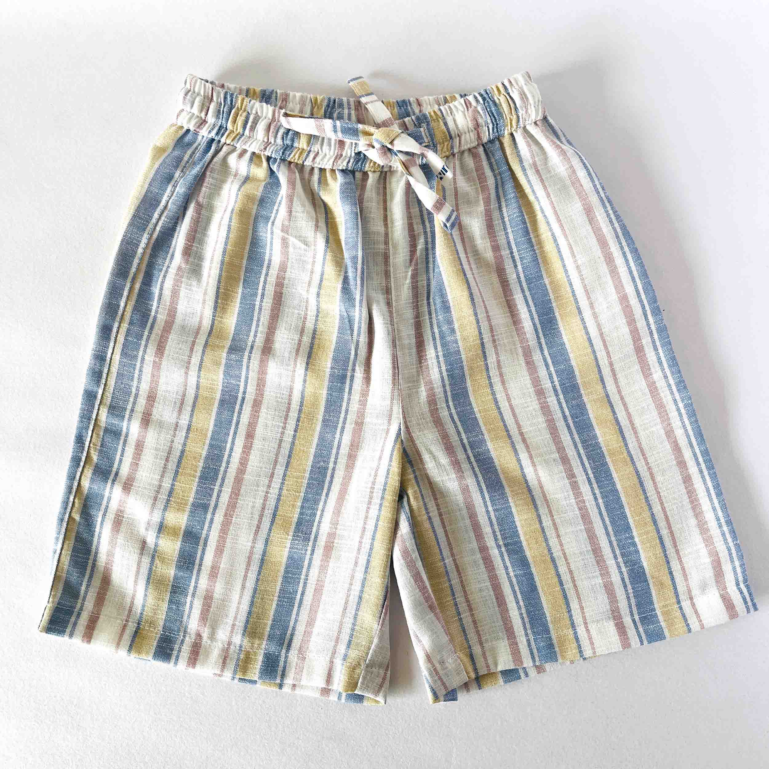Multi Striped shorts with a drawstring on a white background