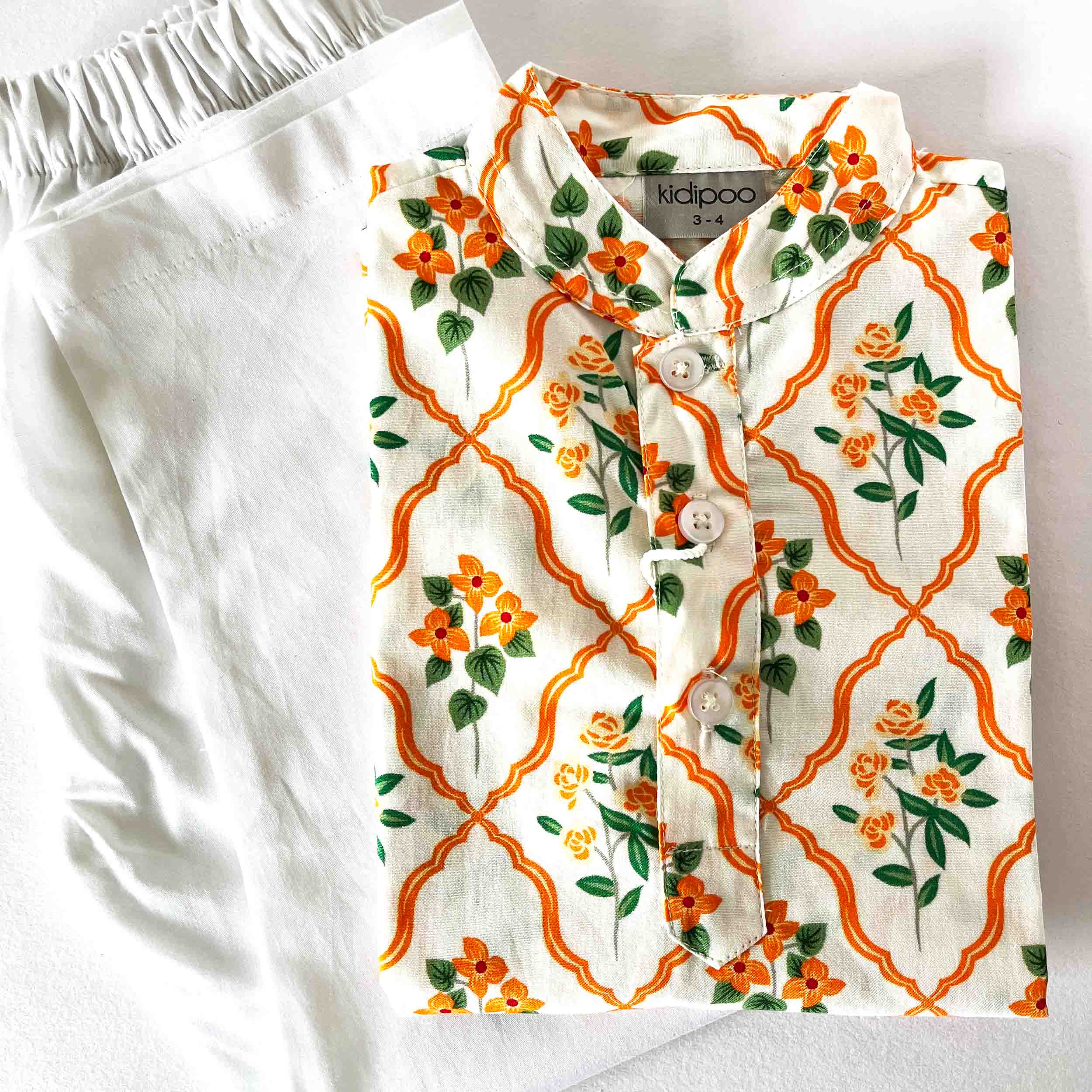 Kids orange floral cotton kurta pajama set with long sleeve shirt and elastic waist plain white pajama breathable festive wear