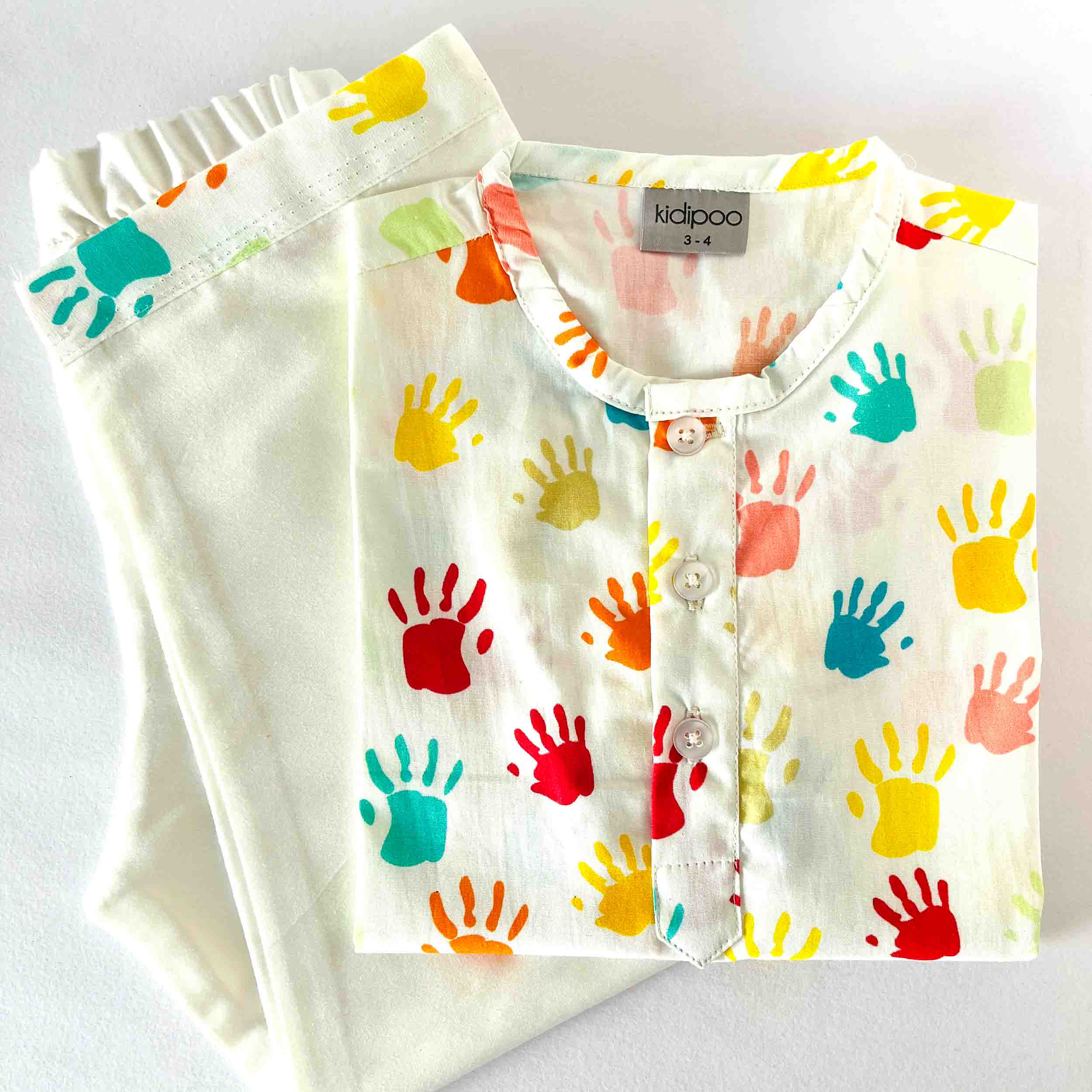 Kids Holi special cotton kurta pajama set with multicolor handprint design soft breathable festive outfit for boys and girls