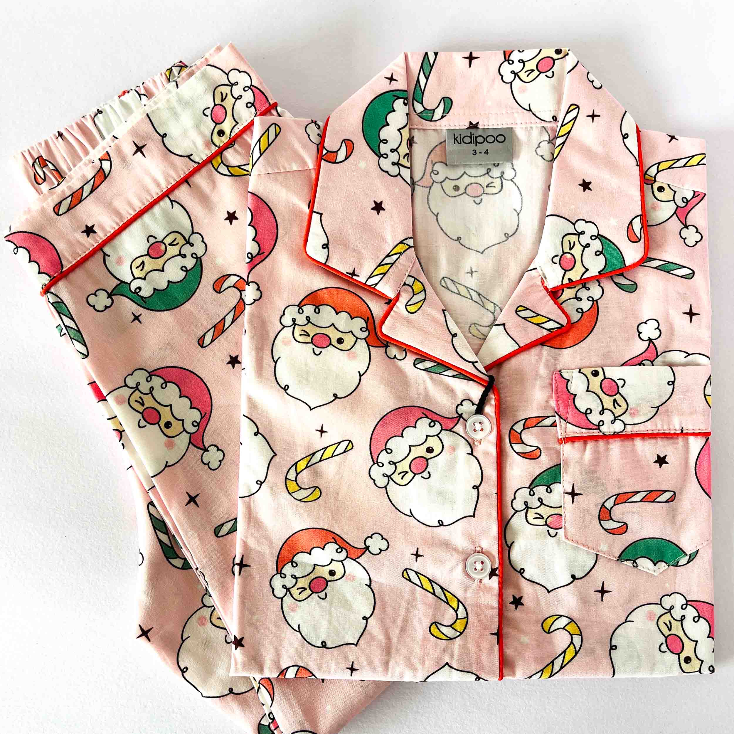 Pink Santa print kids night suit soft cotton sleepwear set folded view