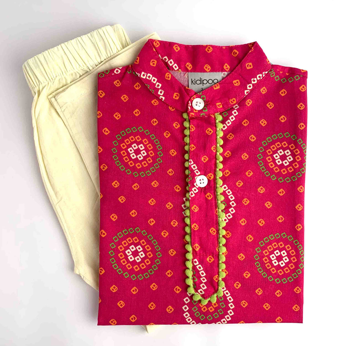 Pink Badhni printed kurta pajama set for kids with cream pajama